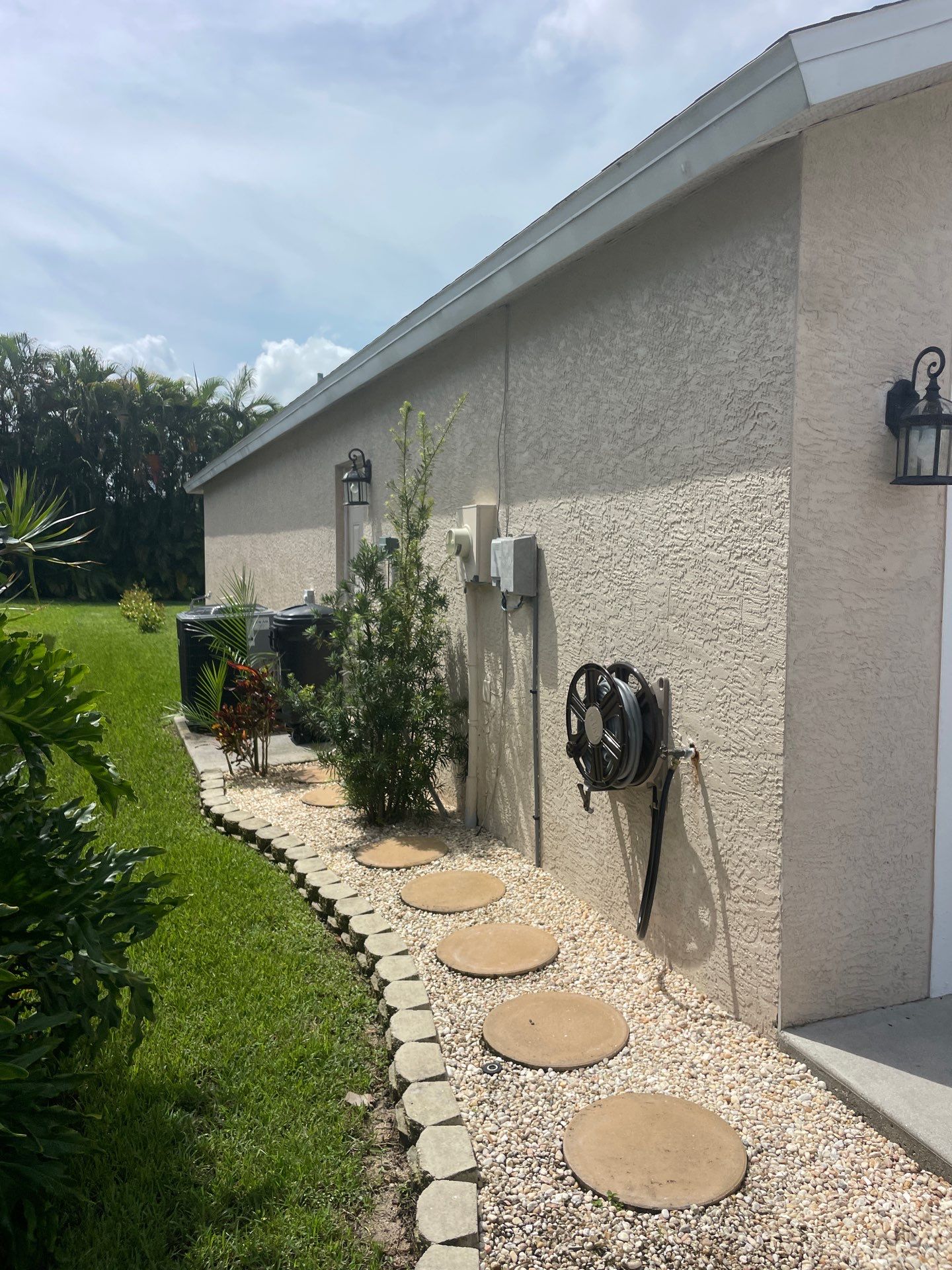 White Aluminum Seamless Gutters and Downspouts in Estero FL by Gutter Professors