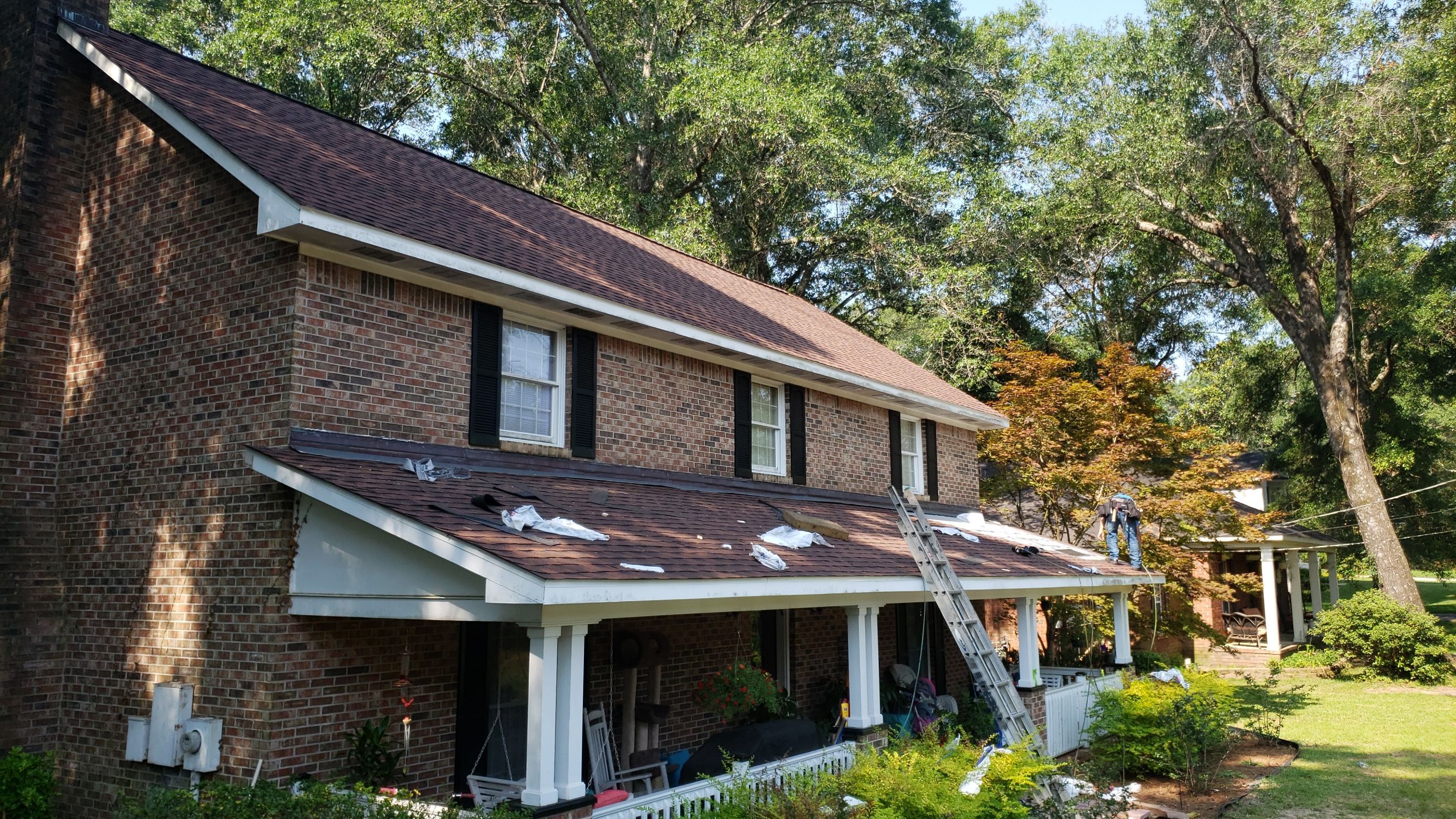 Residential Roofing Installation using Roof Replacement by American Roofing & Construction LLC