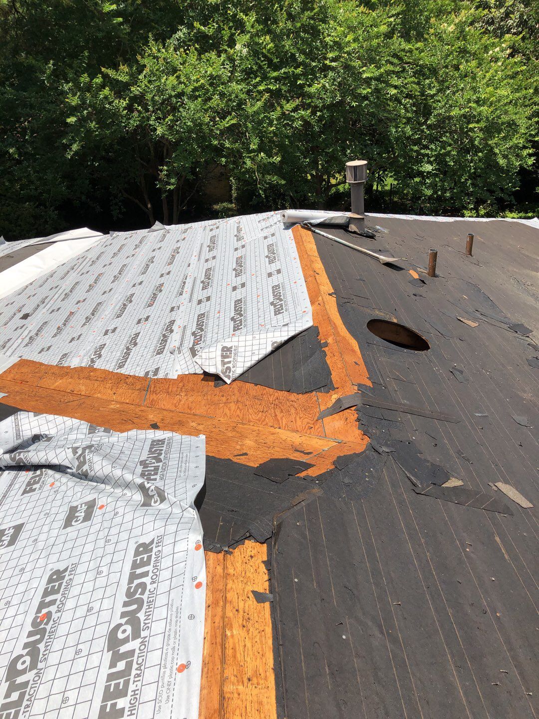 Residential Roofing Installation using Roof Replacement by American Roofing & Construction LLC