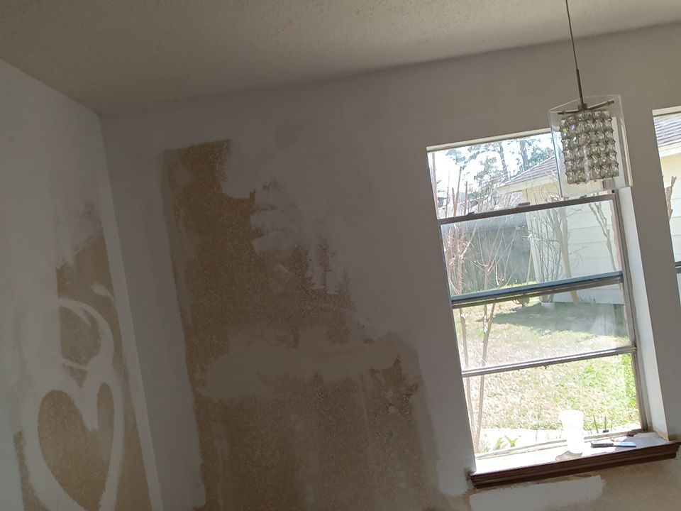 Interior and exterior painting project by Roof Concepts Construction