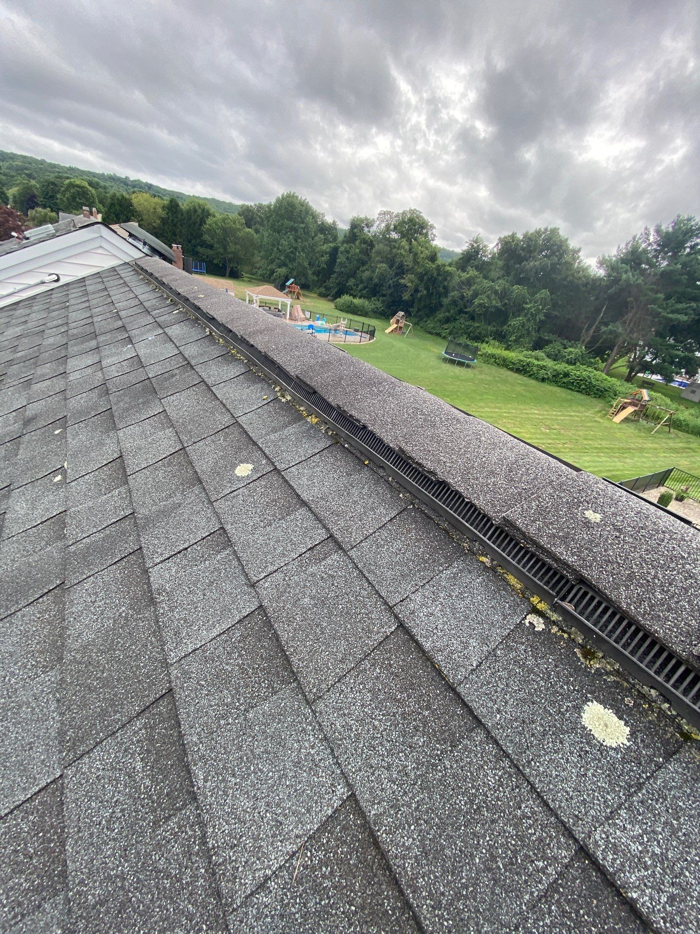 Estate Gray Shingles by Reimagine Roofing