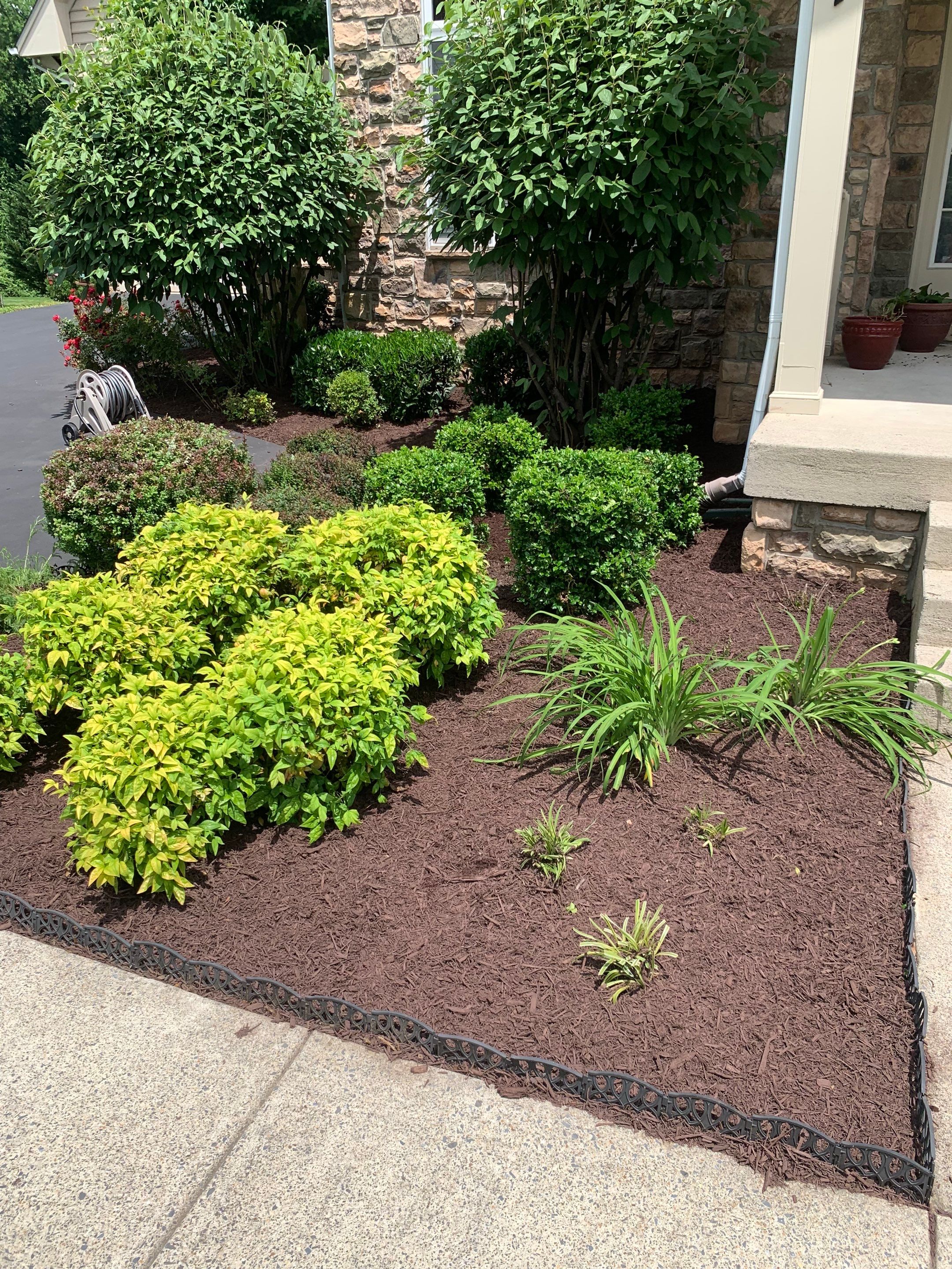 Landscape Cleanup & Mulch  by The Smet Companies, LLC