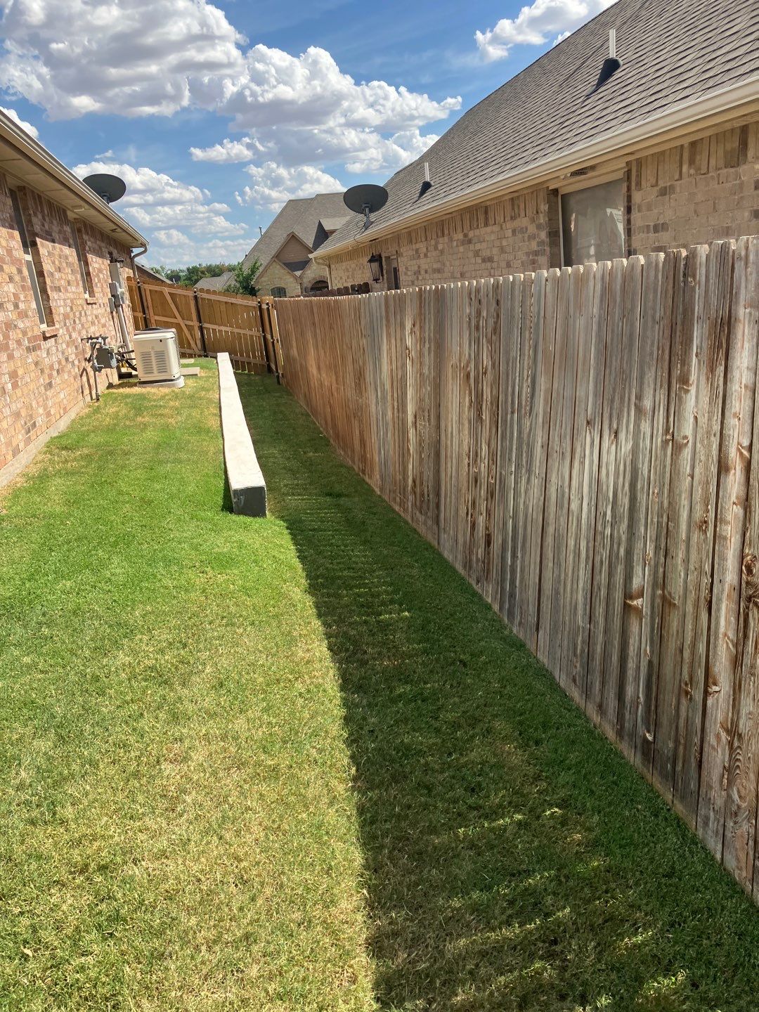 Concrete Slab , Retaining Wall , Fence, and landscape. by Clays Services Inc