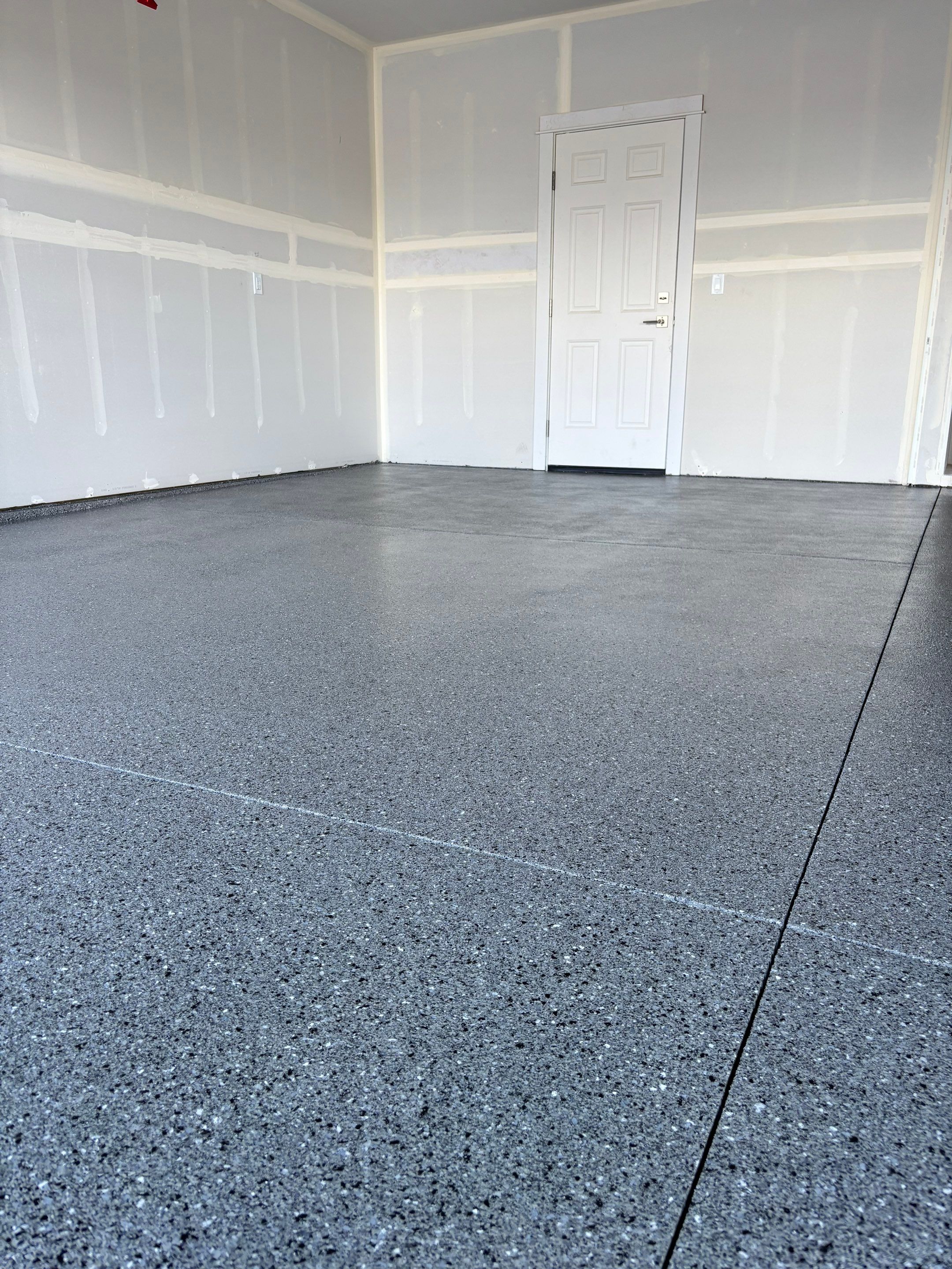 Garage Transformation using Slate Hybrid by Croc Coatings, LLC