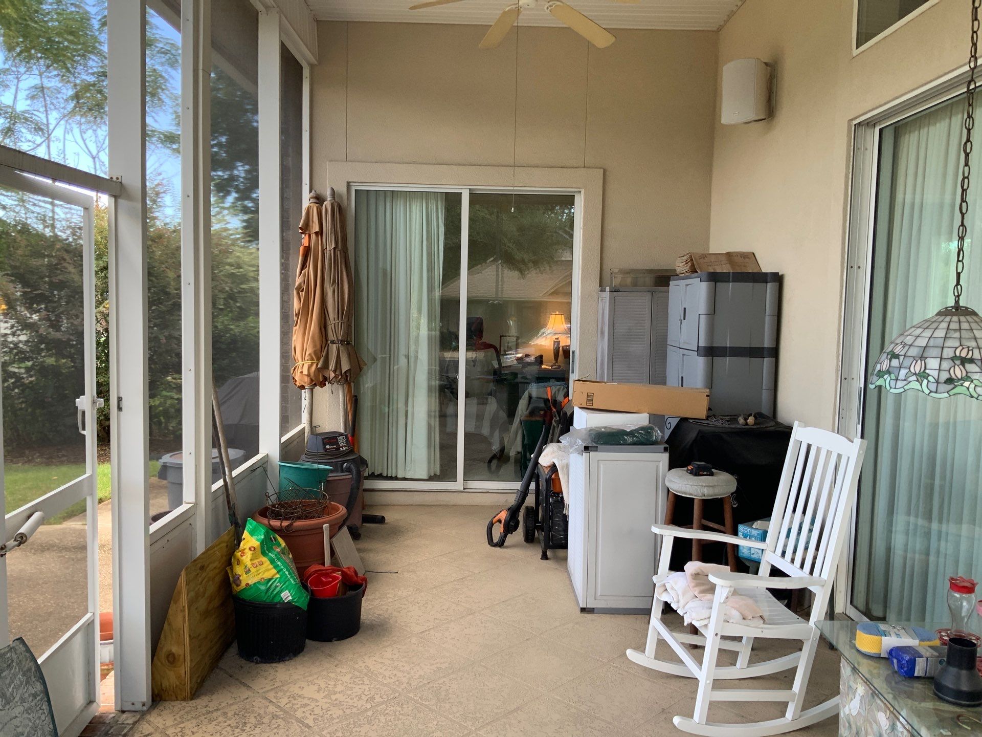 Screen Room Conversion to Glass Under  by Titan Sunrooms