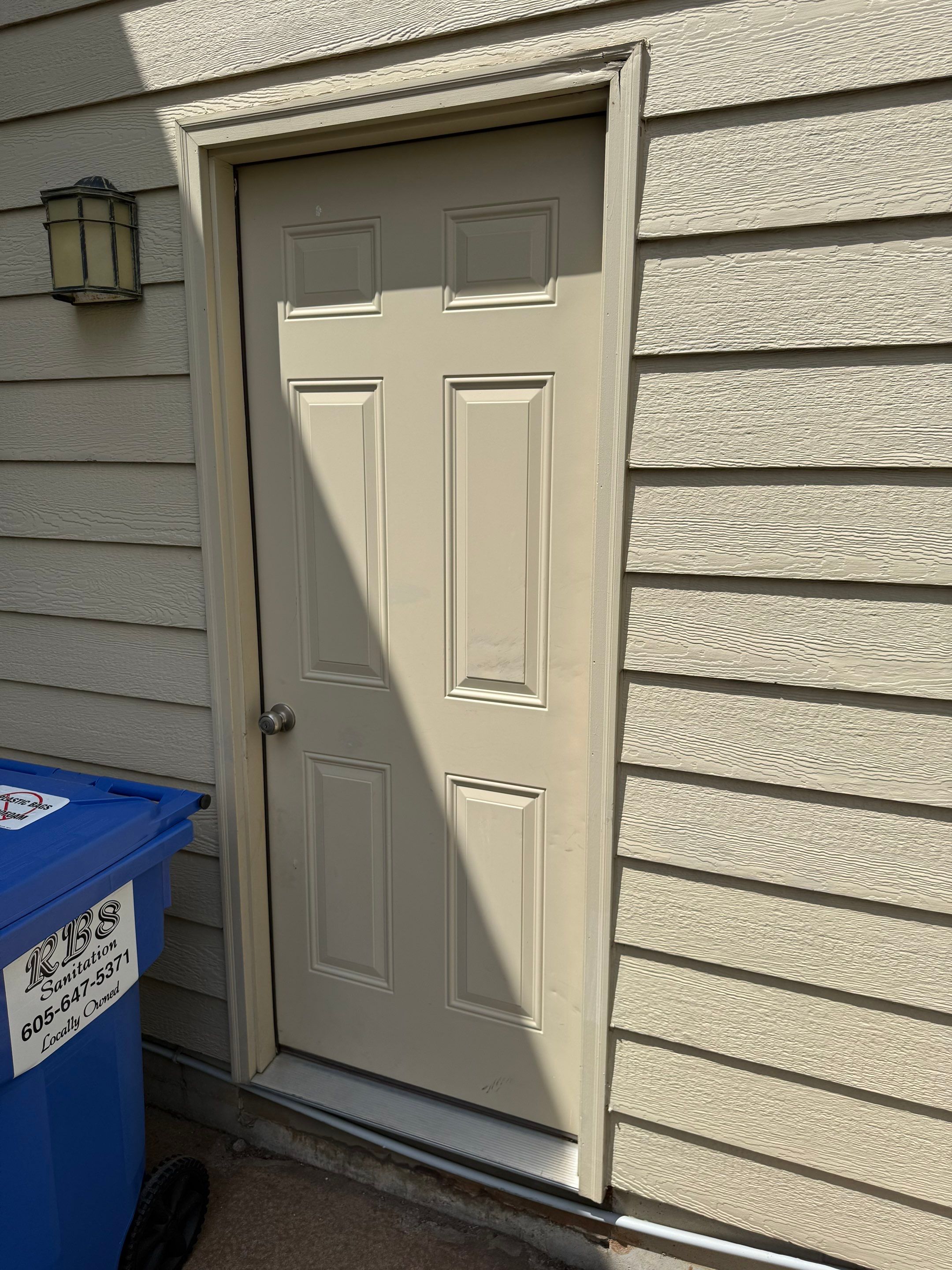Sioux Falls Exterior Siding Replacement and Custom Deck Upgrade by Select Painting, Coatings & Garage Cabinets