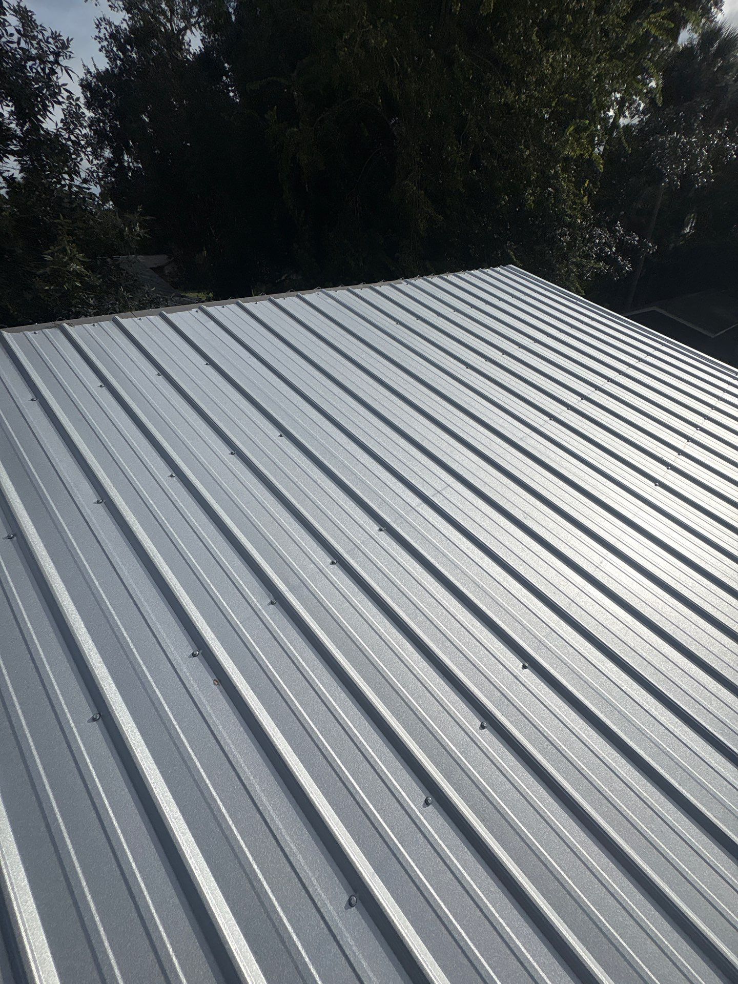 Residential Metal Roofing Installation with Ultra Rib Panels in New Smyrna Beach by Pinnacle Roofing Group