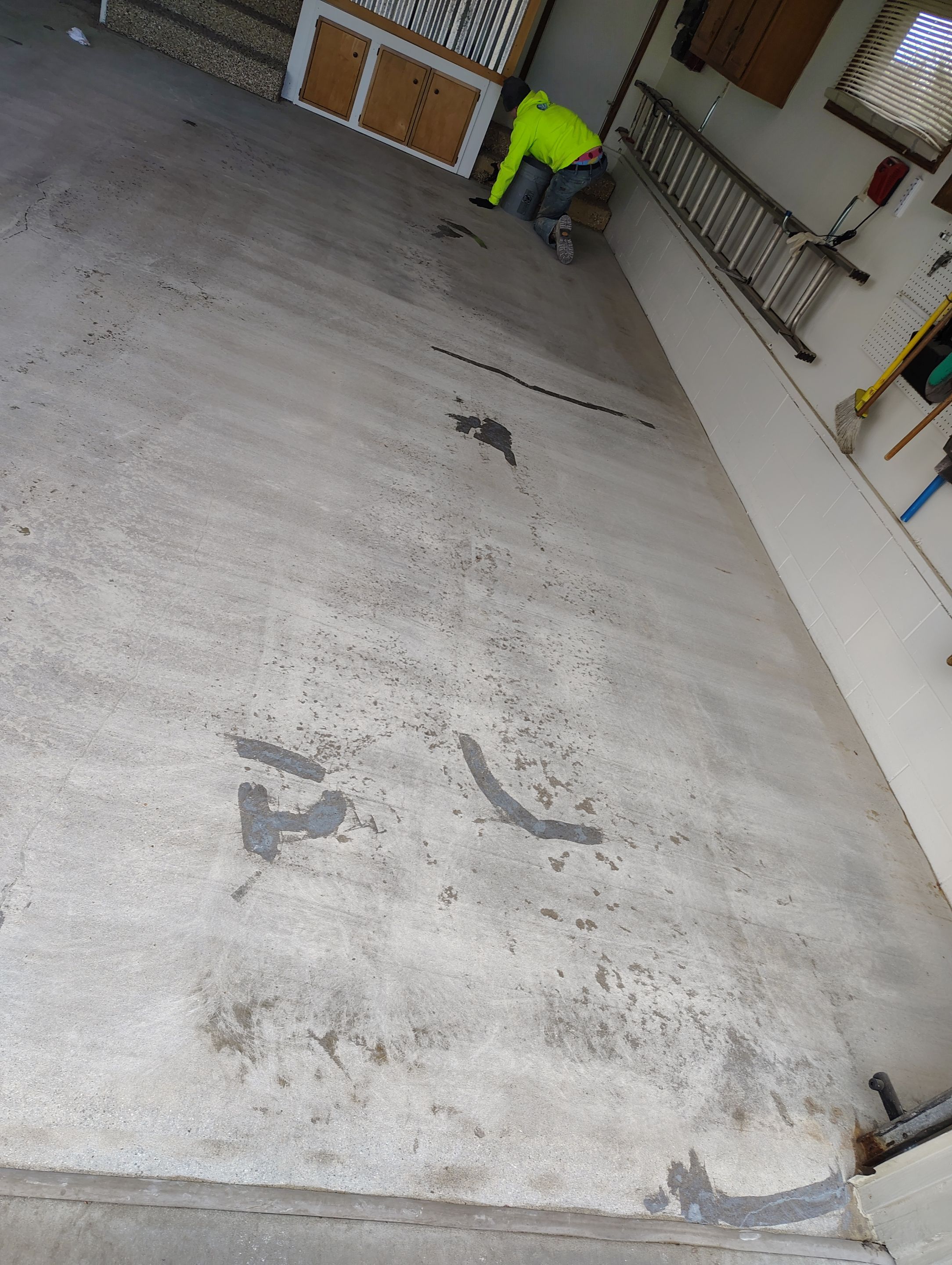 Multi-Colored Flake Epoxy Garage Floor Coating and Crack Repair by Select Painting, Coatings & Garage Cabinets