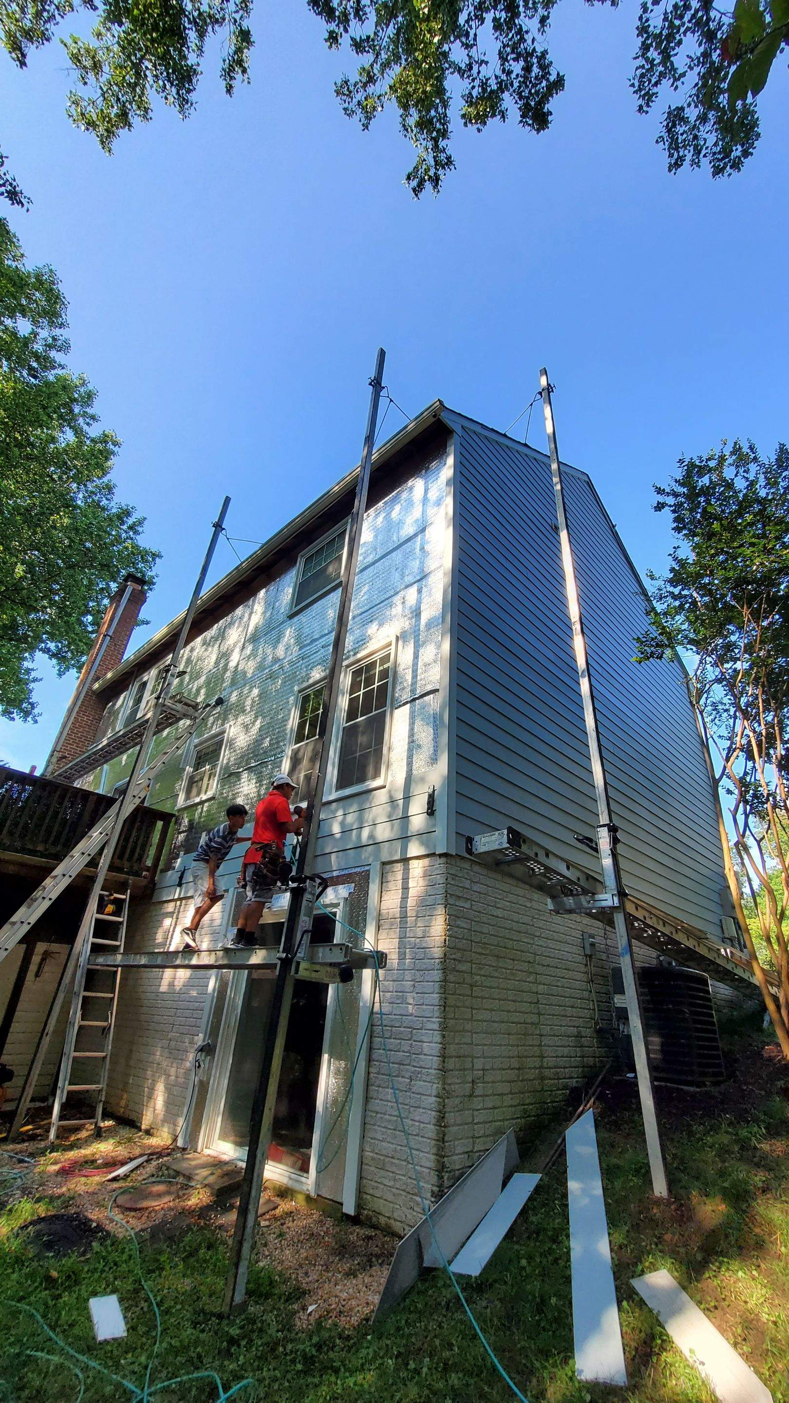 Exterior Home Makeover using GAF Timberline HDZ, GAF Decotech, and James Hardie Siding by American Home Contractors