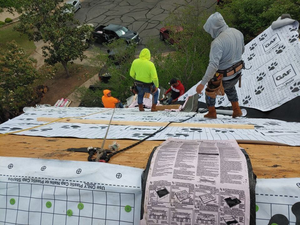 Residential Roof Replacement and Solar Panel Integration in Austin by Caliber Restoration LLC