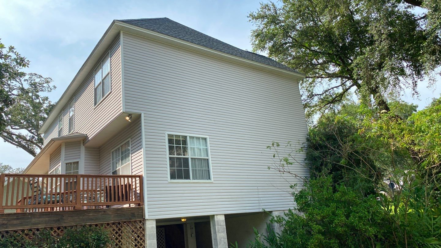 Residential Roofing Installation using Roof Replacement by American Roofing & Construction LLC