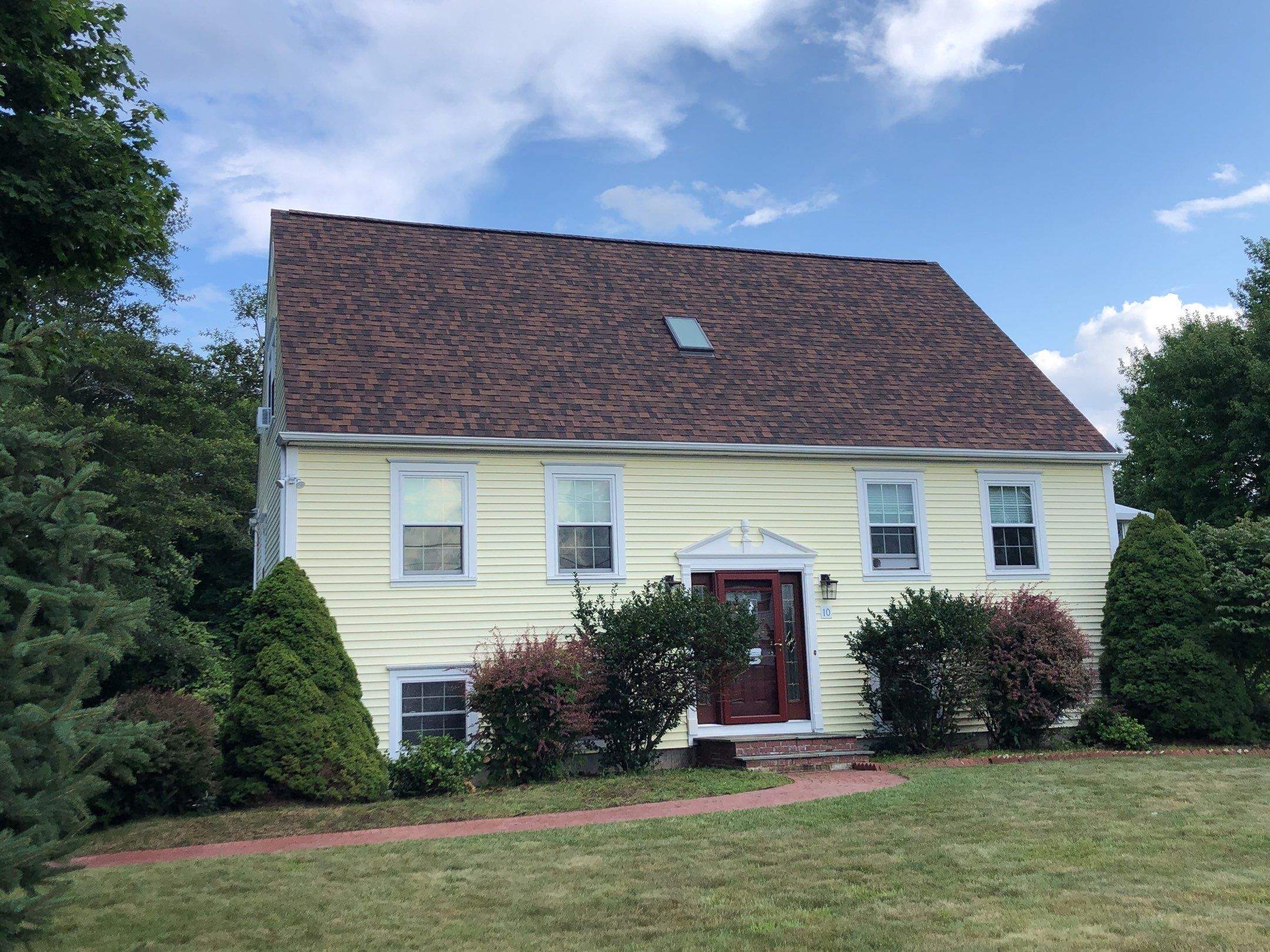 Burnt Sienna Roofs by Pinnacle Roofing & Skylights