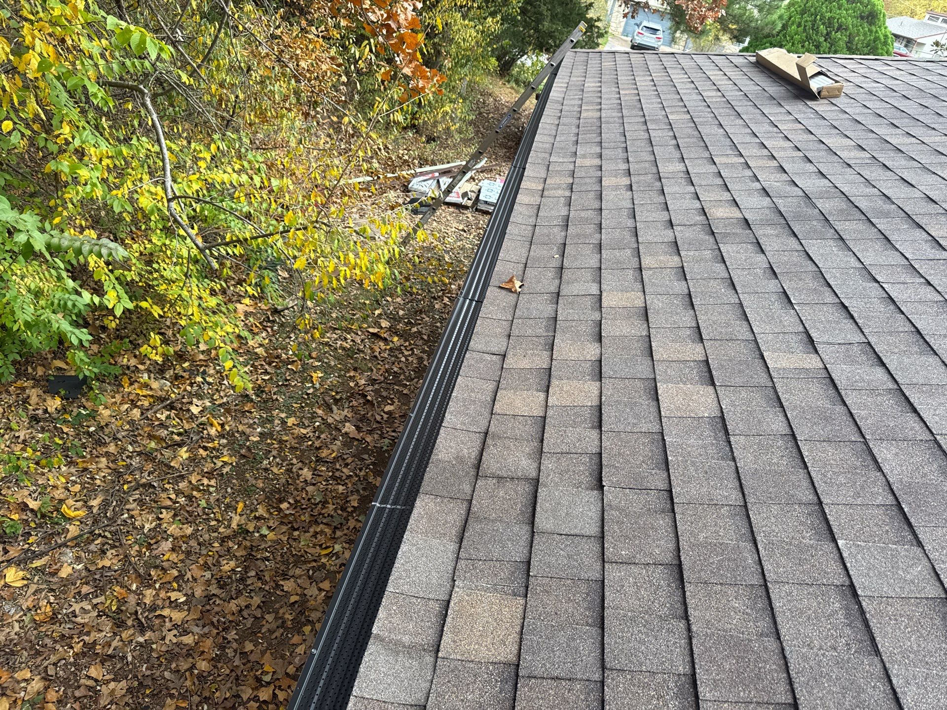 Multi Structure Residential Roofing & Gutter Guards Install  by Titan Commercial & Residential Roofing 