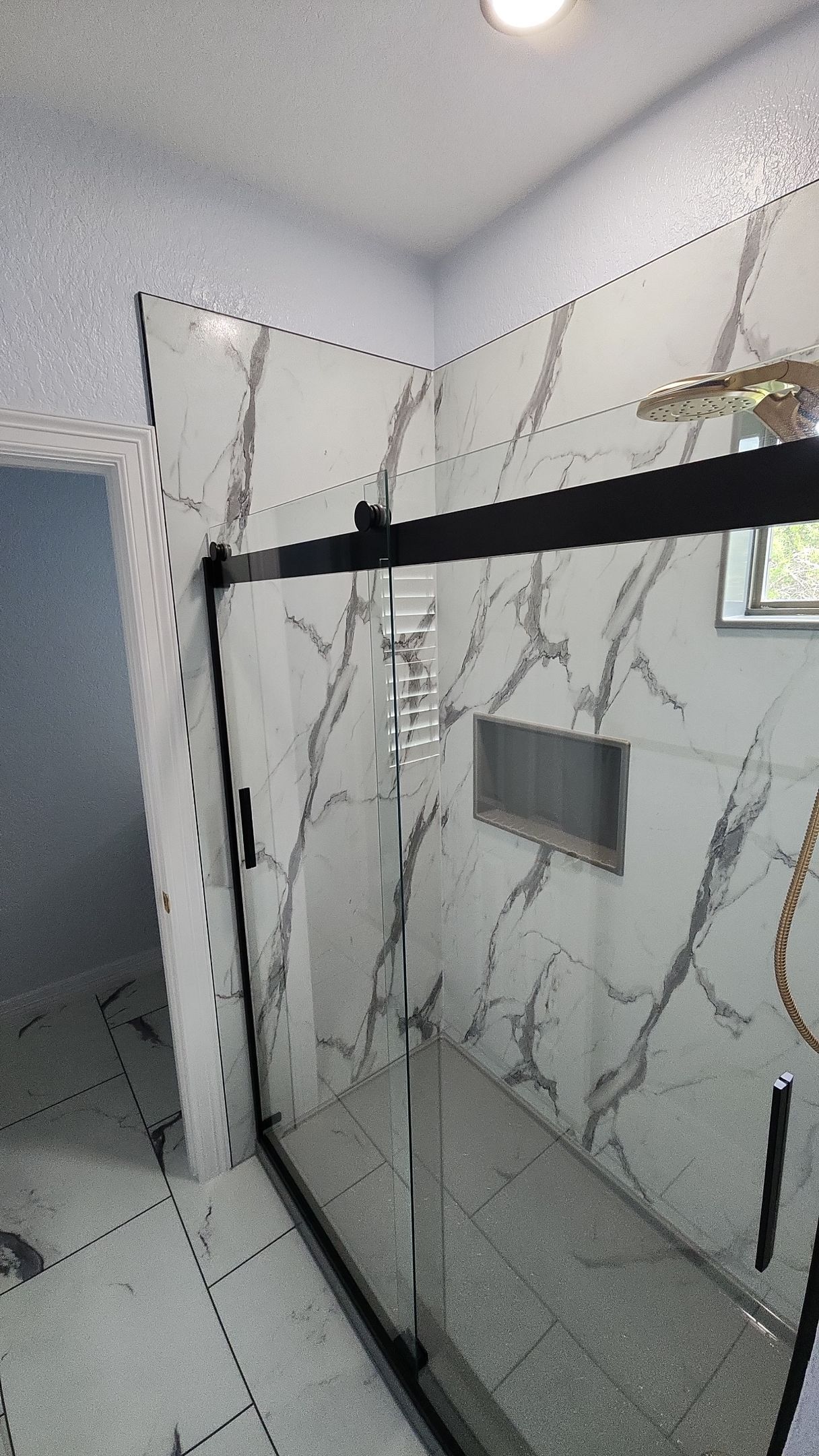 Monochromatic Bathroom Remodel featuring Walk-In Shower by Legacy Bath and Kitchen 