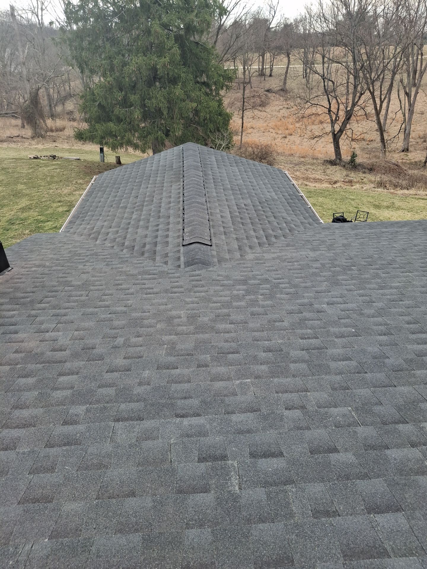 Residential Roofing Installation using GAF Timberline HDZ Charcoal by Rainstoppers Roofing
