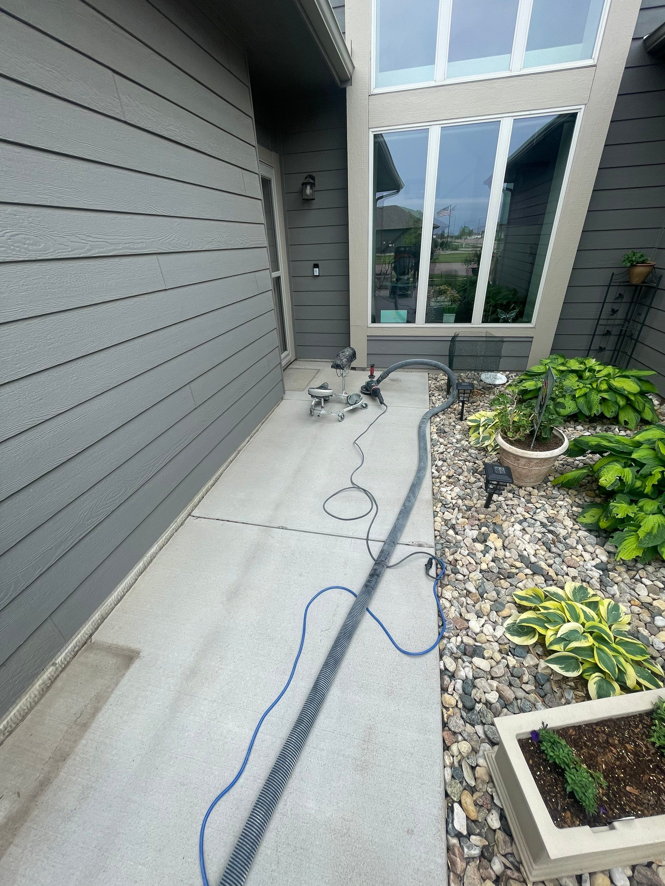 Custom Concrete Coating for Sioux Falls Patio and Front Walkway by Select Painting, Coatings & Garage Cabinets