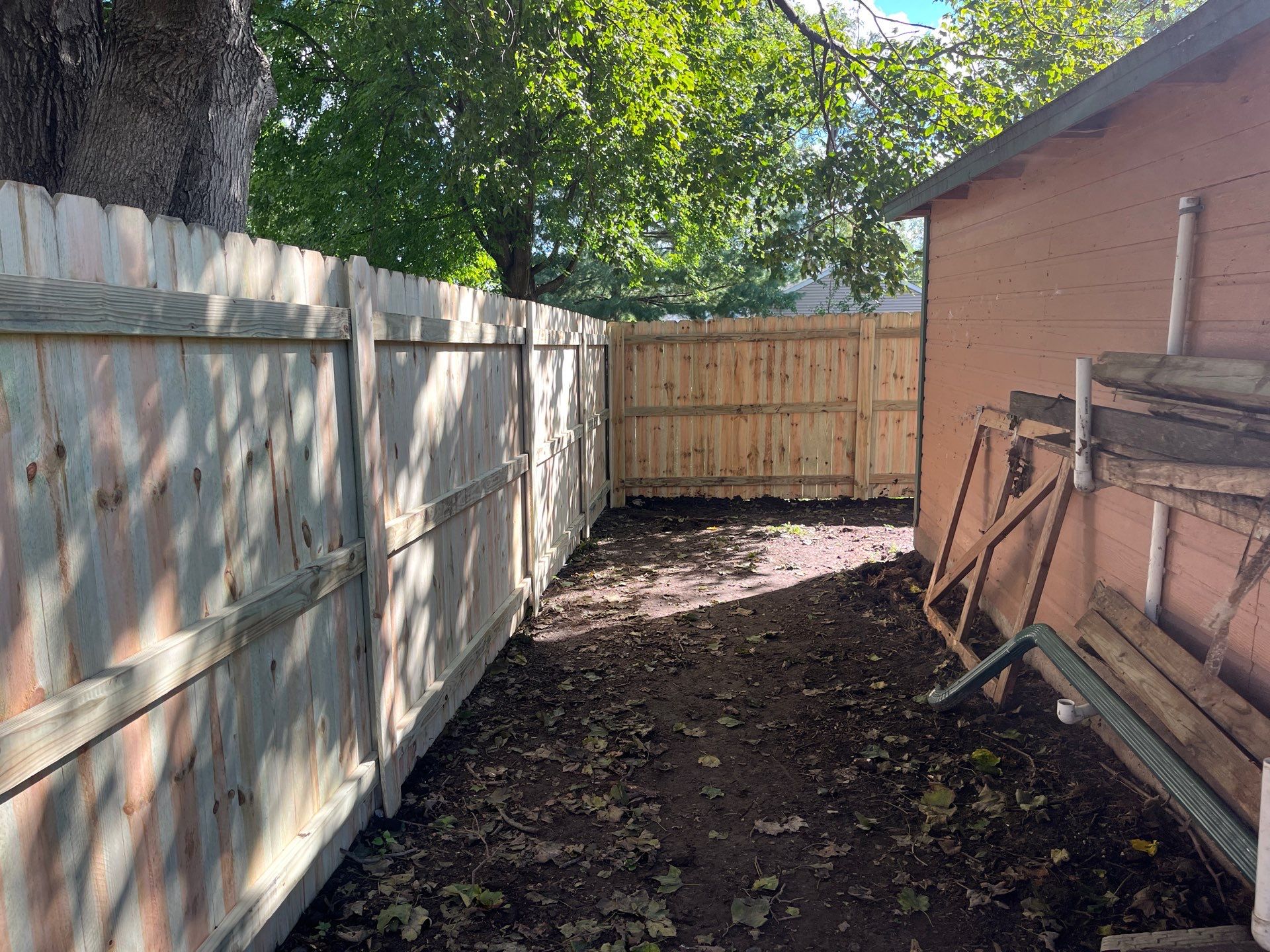 Pressure-Treated Wood Privacy Fence Installation in Waverly, Iowa by Perfect Picket Fence and Stain