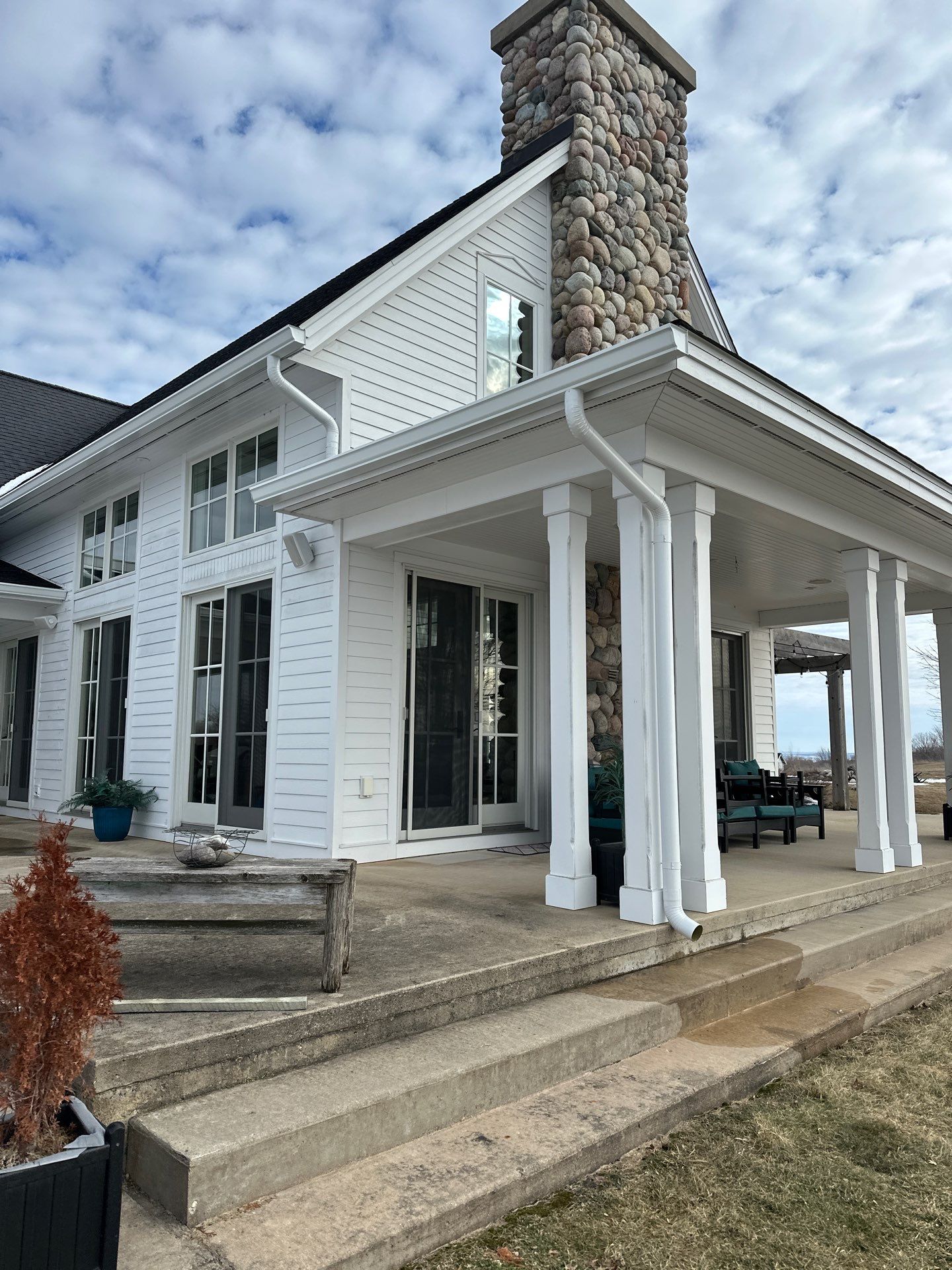 Copper Gutter and Downspout Installation in Suttons Bay by Rainbow Seamless Systems