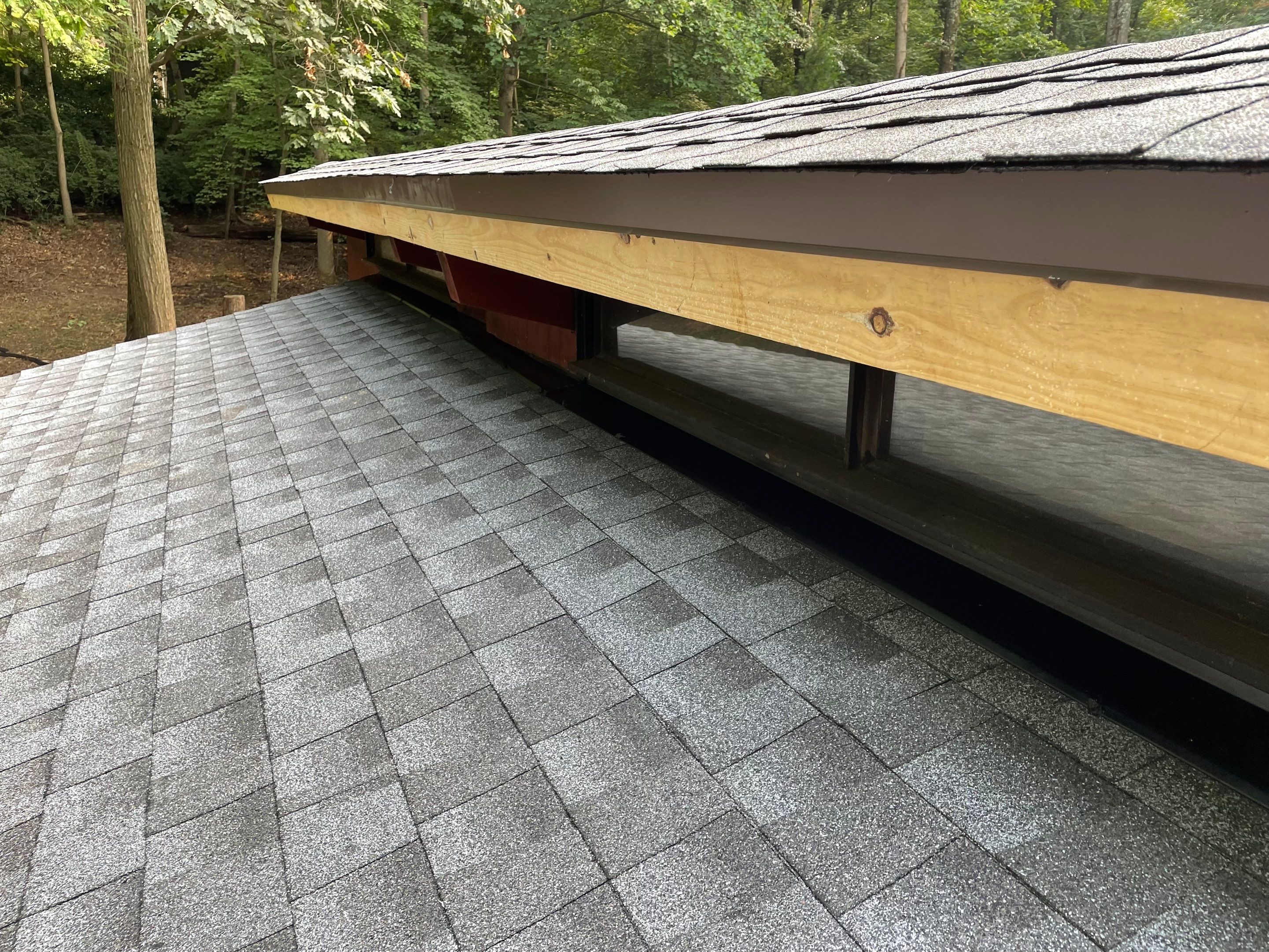Deckhouse Roof Replacement by American Home Contractors