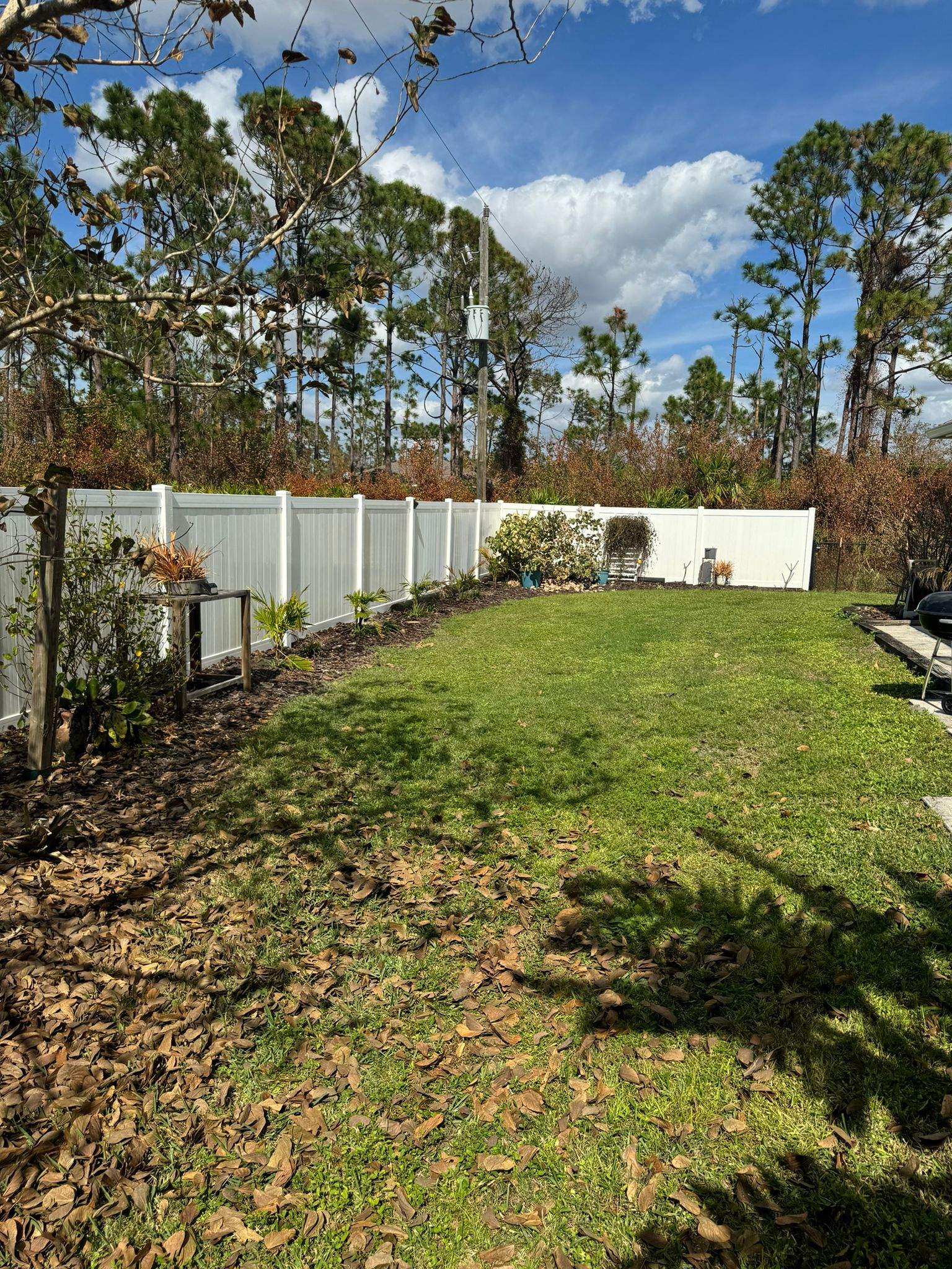 White Vinyl Privacy Fence Installation in Port Charlotte by True Fence LLC