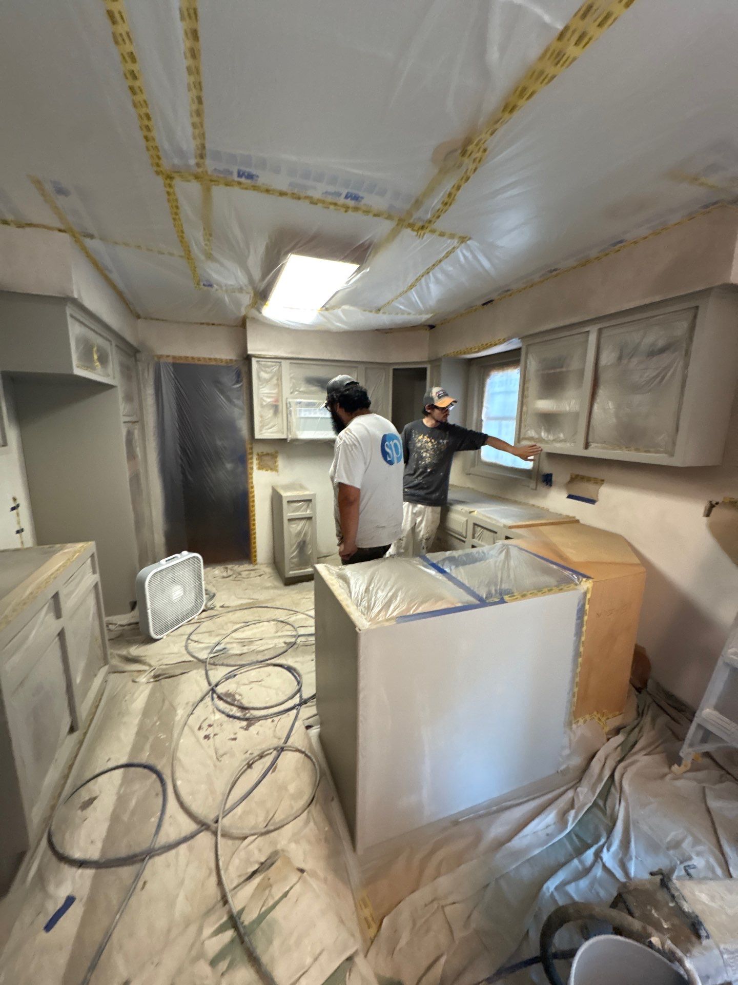 Kitchen Cabinet Painting and Hardware Update in Sioux Falls by Select Painting, Coatings & Garage Cabinets