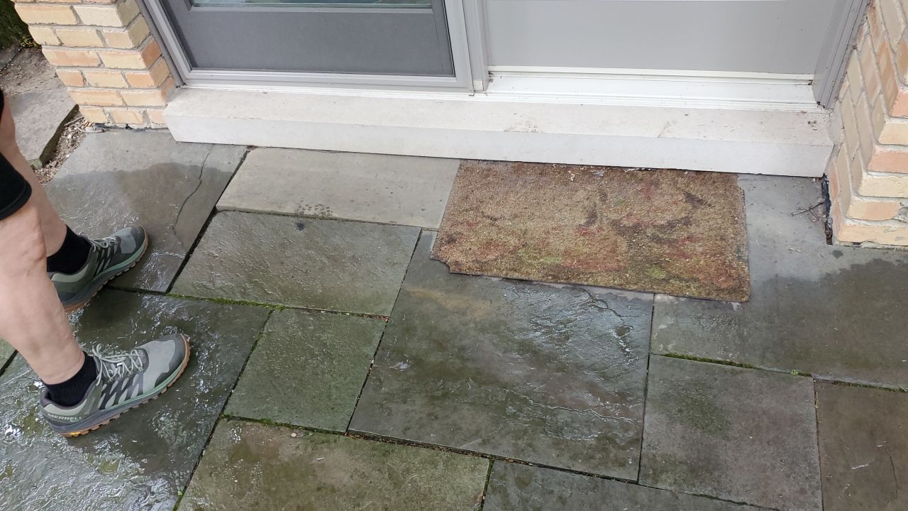 Bluestone patio cleaning by Northern Power Washing LLC.