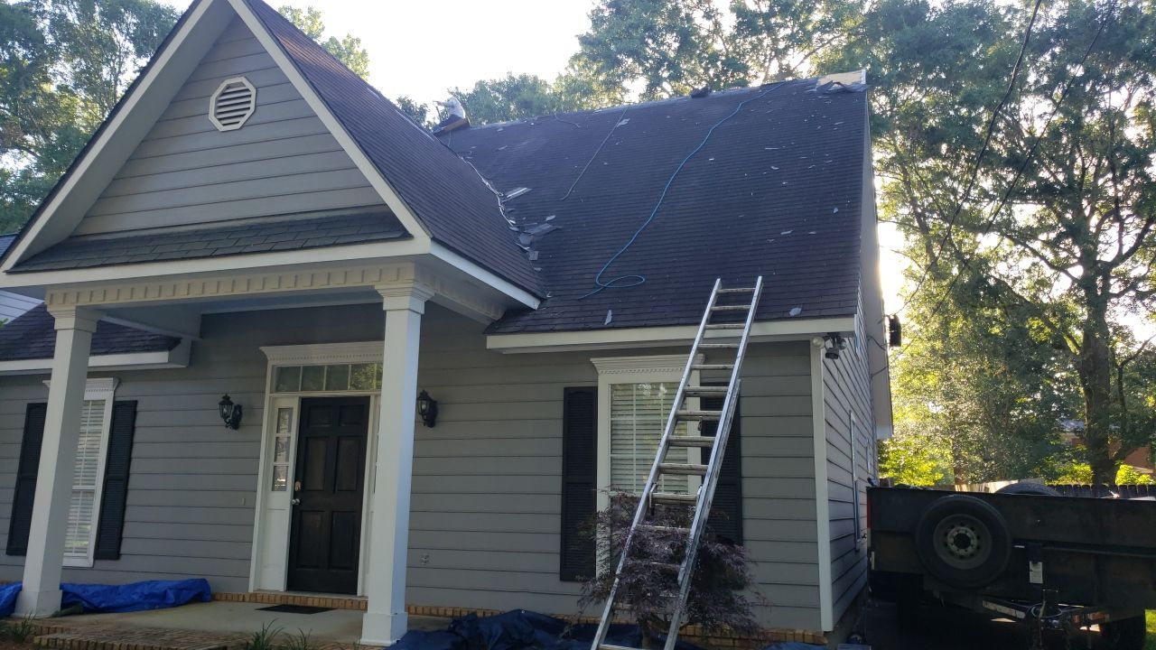 Residential Roofing Installation using Roof Replacement by American Roofing & Construction LLC