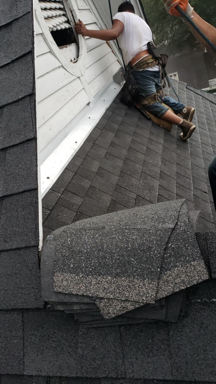Residential Roofing Installation using Roof Replacement by American Roofing & Construction LLC