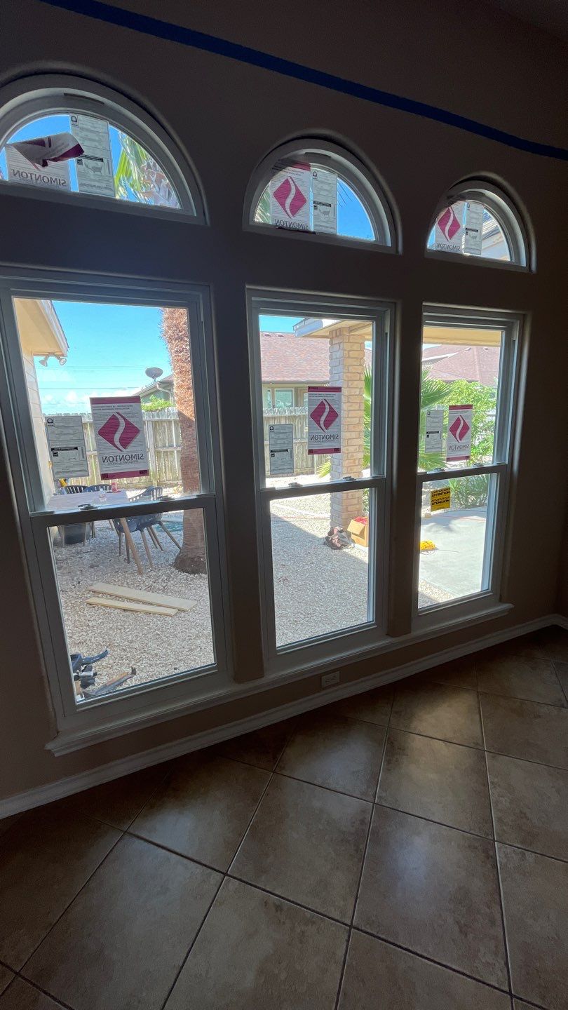 Curved Trim Windows by Bayfront Roofing and Construction