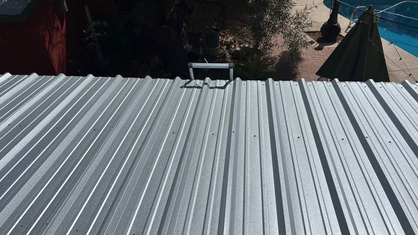 Silver Metallic Exposed Fastener by Reimagine Roofing