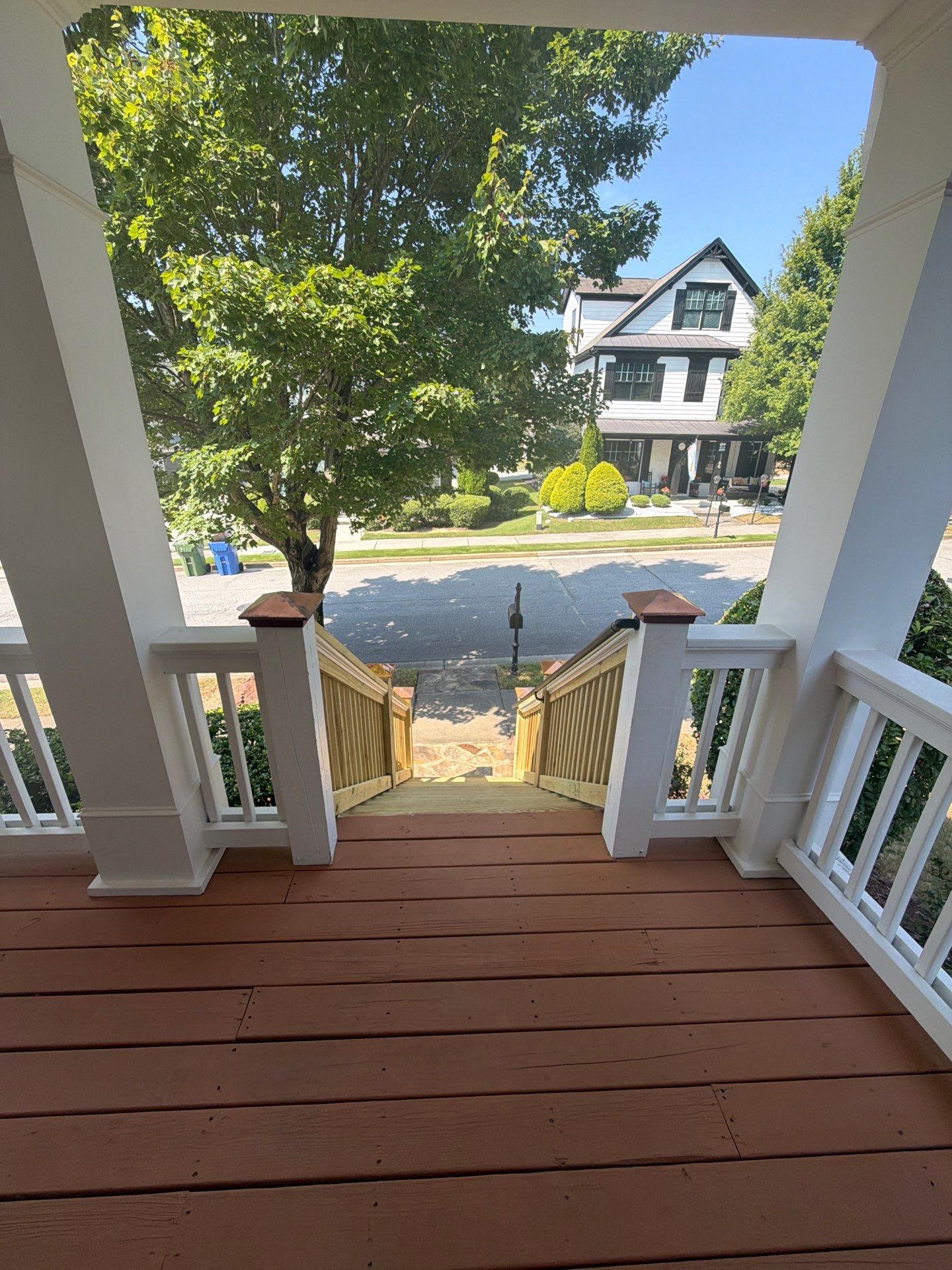 Atlanta Exterior Home Refresh with Blue Siding and Deck Staining by Swift Home Renovations 