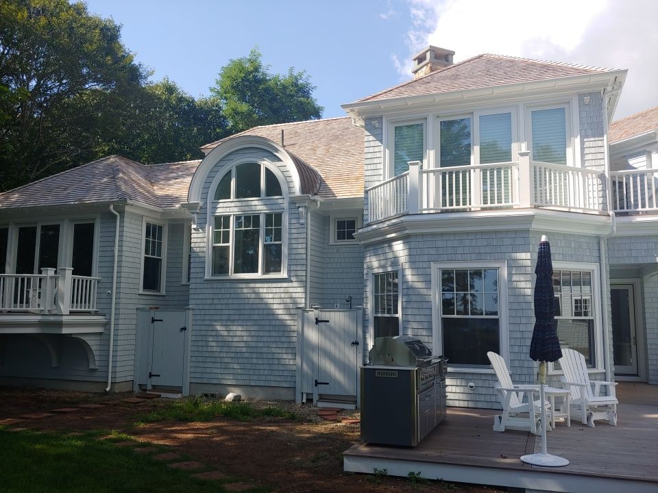 Gutter Installation using 6" Half Round Aluminum Gutter over Crown Moulding by Gutter Pro Enterprises