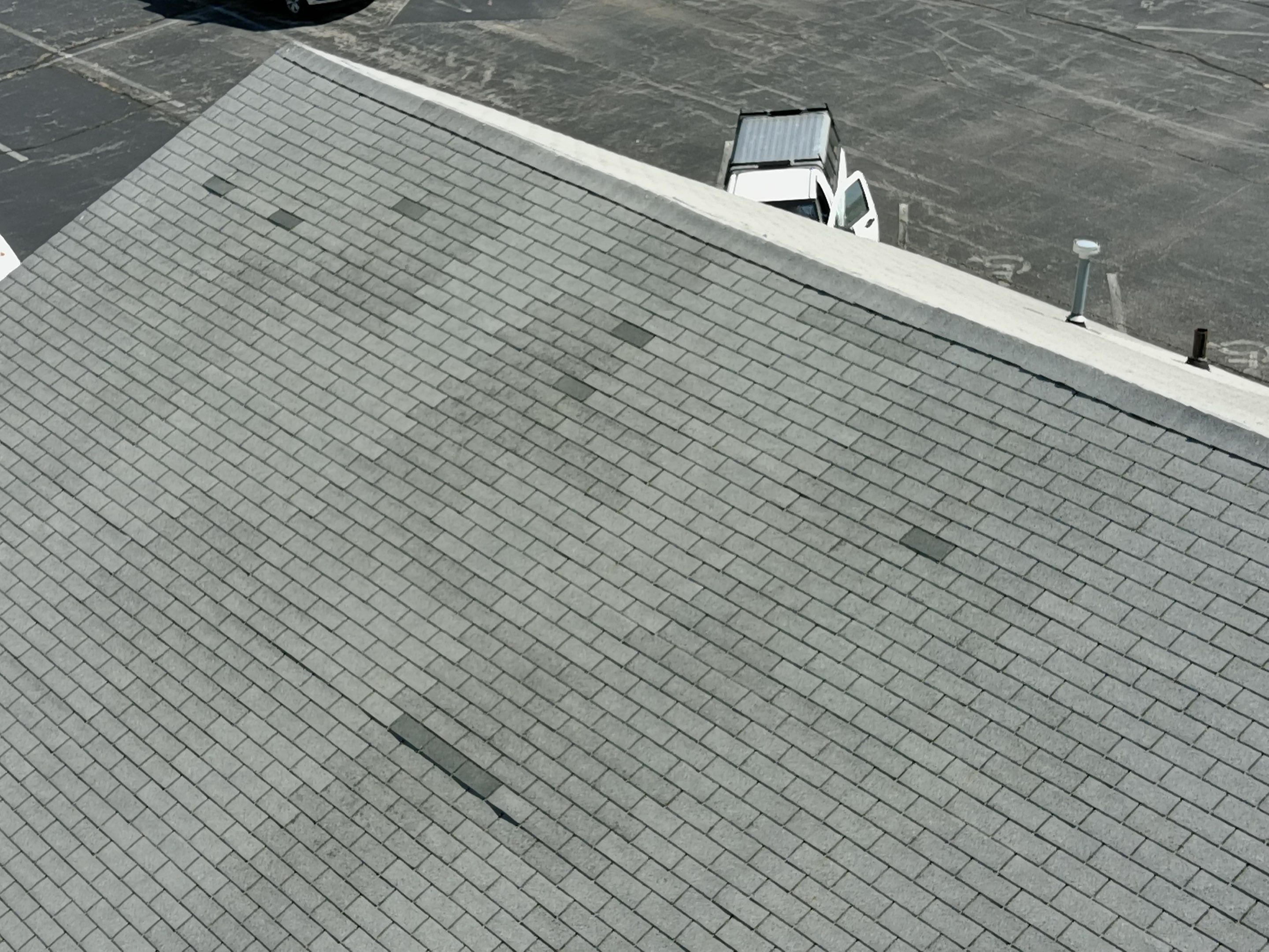 Commercial Roofing Installation using Performance Shingles by Mr. Roofer