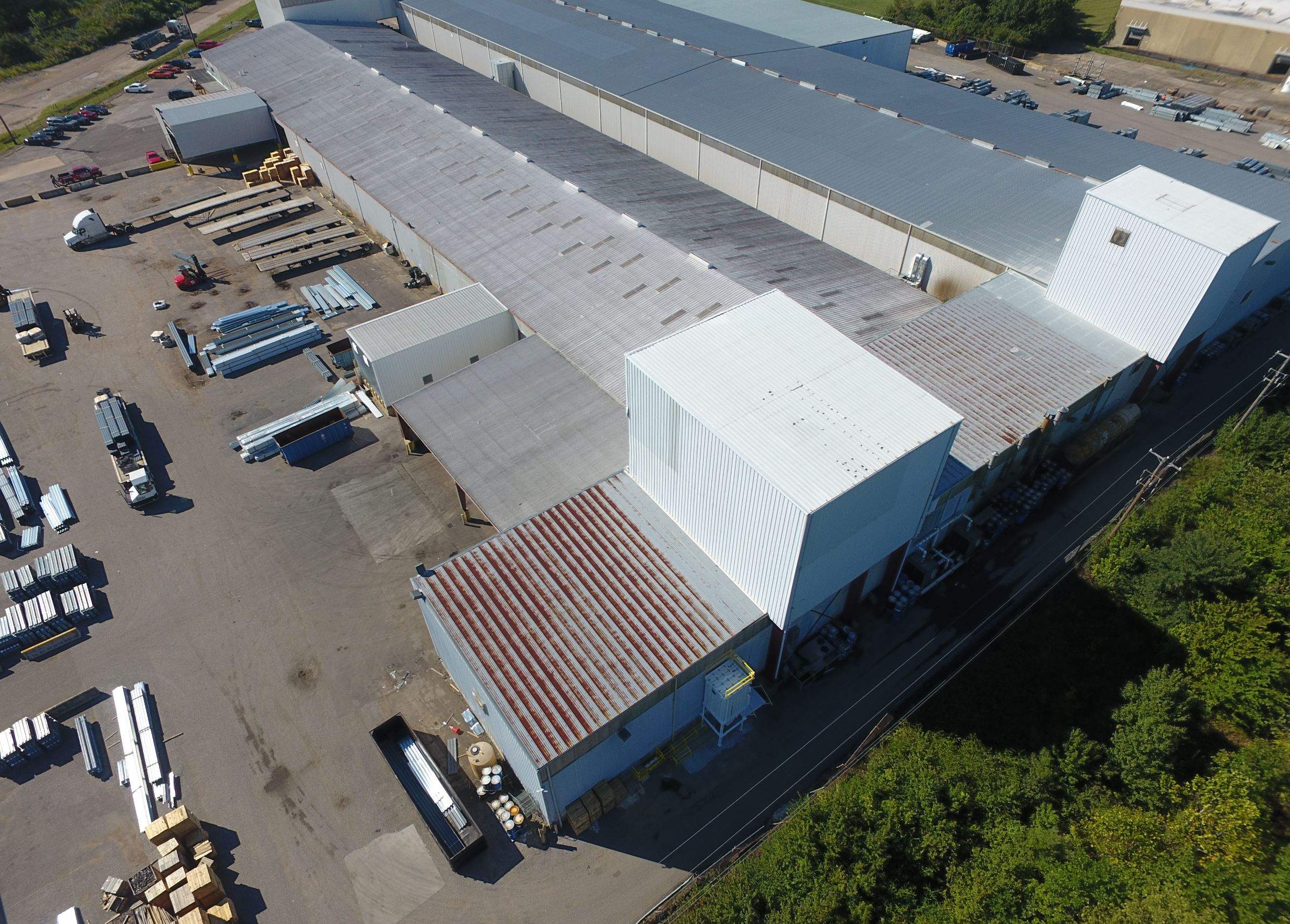 Commercial Metal Restoration System using Aldocoat Coatings by Hostetler Roofing