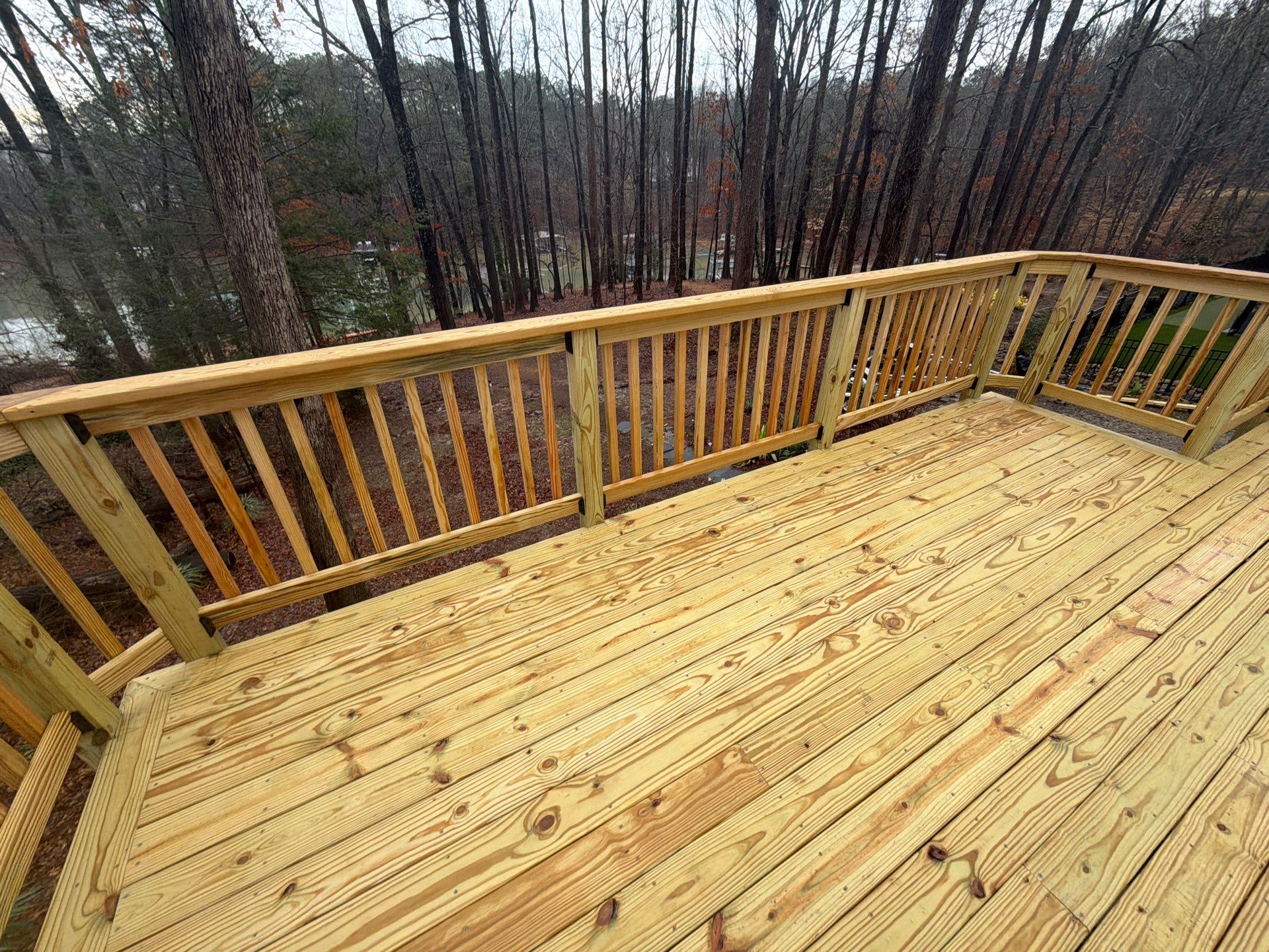 Buford, GA Deck Resurface and Extension using Pressure Treated Pine by Nelson Exteriors