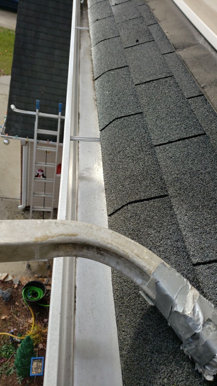 gutters and Driveway by Power Wash Masters LLC