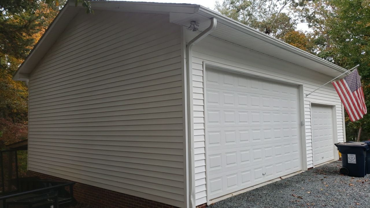 House Wash using cleaner by Power Wash Masters LLC