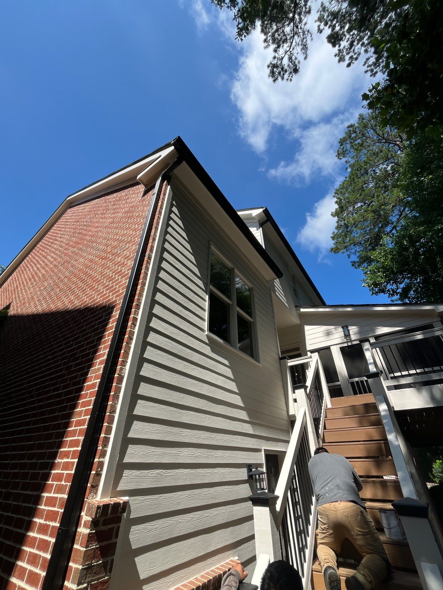 Deck Stain and Rotten Wood Replacement with James Hardie and Sherwin-Williams Products by Nelson Exteriors