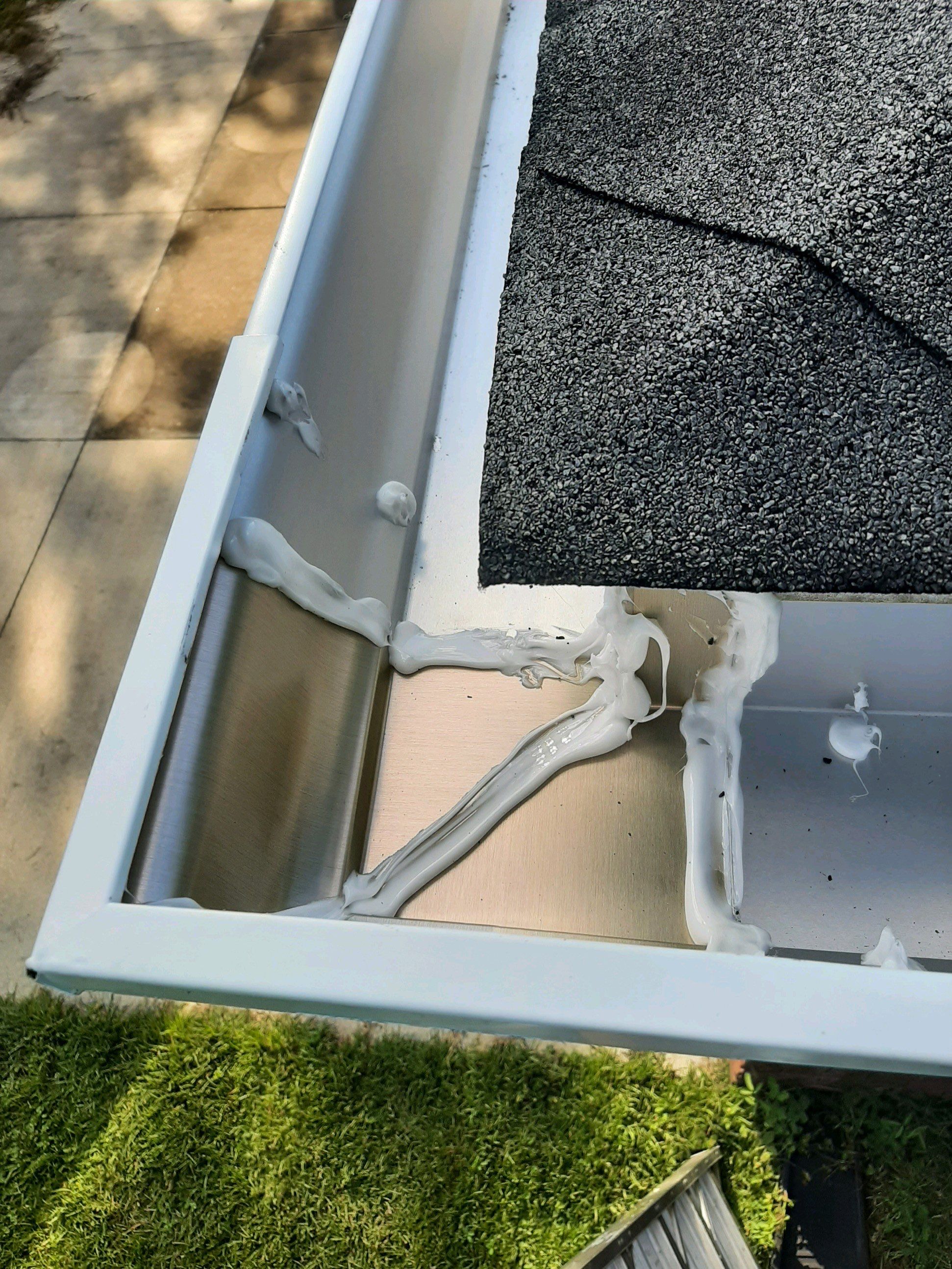 Gutter Installation using White K-Style Seamless Gutters by Gutter Professors