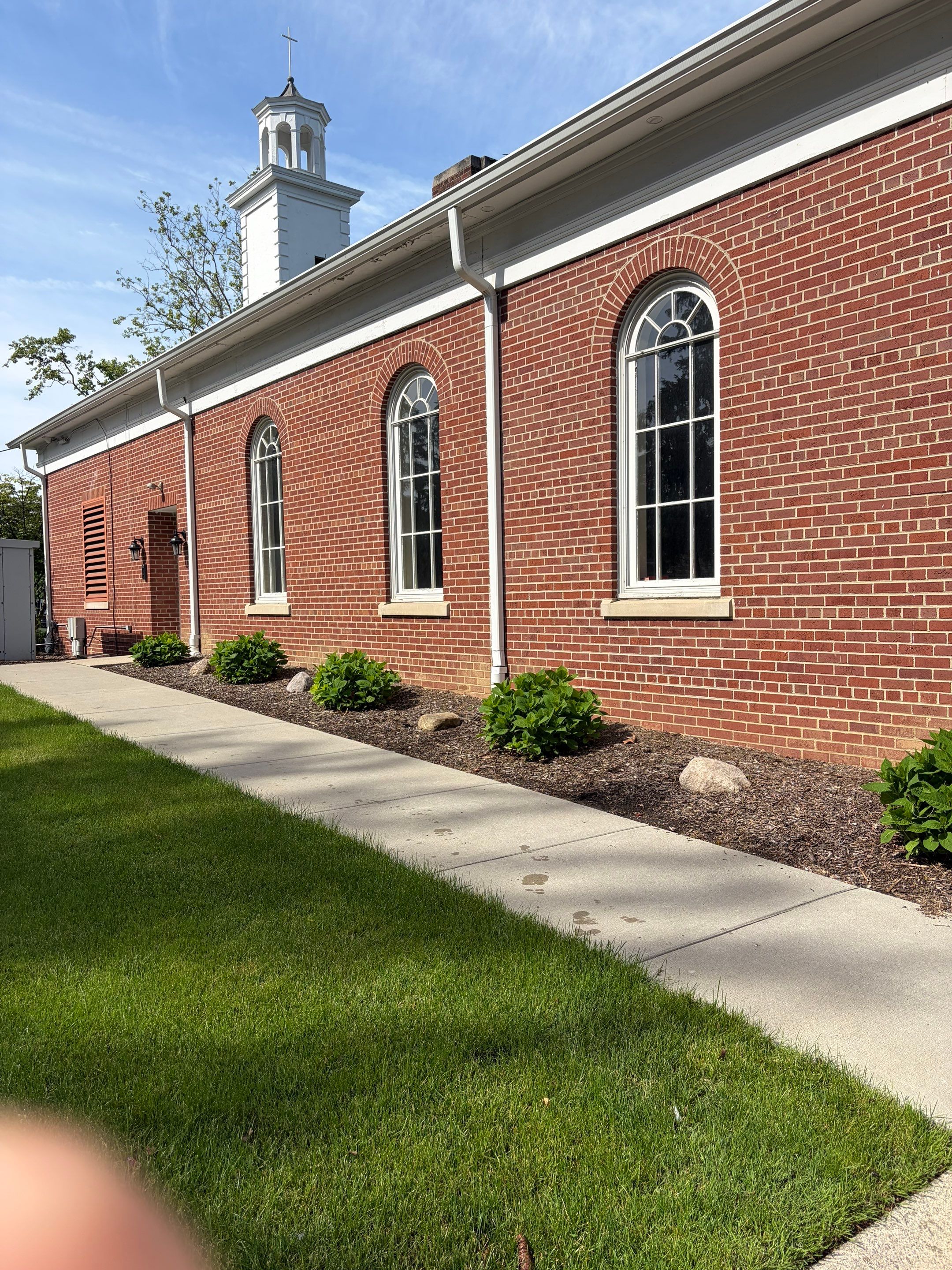 Commercial Wood Trim Restoration and Gutter Replacement in Birmingham by Top Shelf Painter