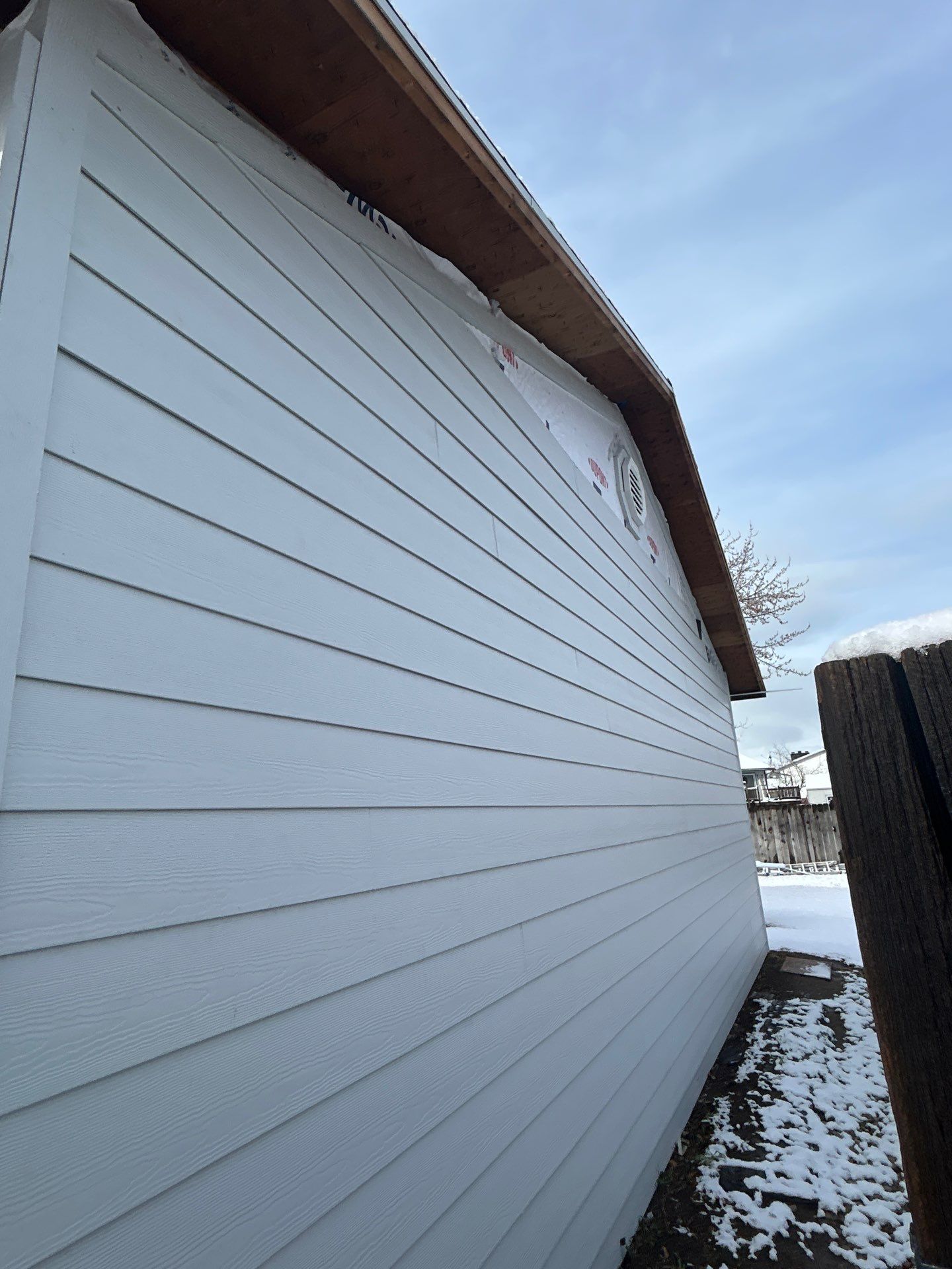 Orem | Crisp Monochromatic Hardie Upgrade | Arctic White by Ideal Siding Utah