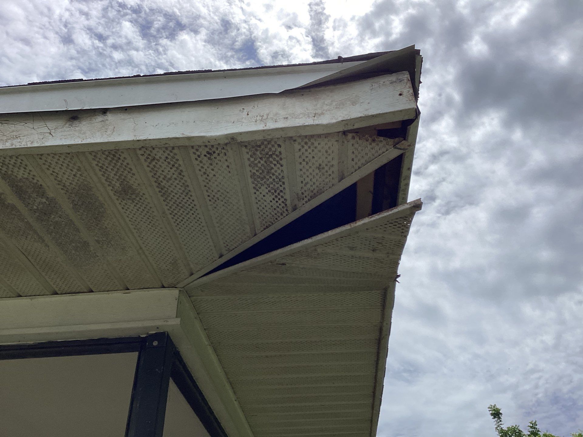 Replace gutter using White Down Spouts in Cape Coral FL by Gutter Professors