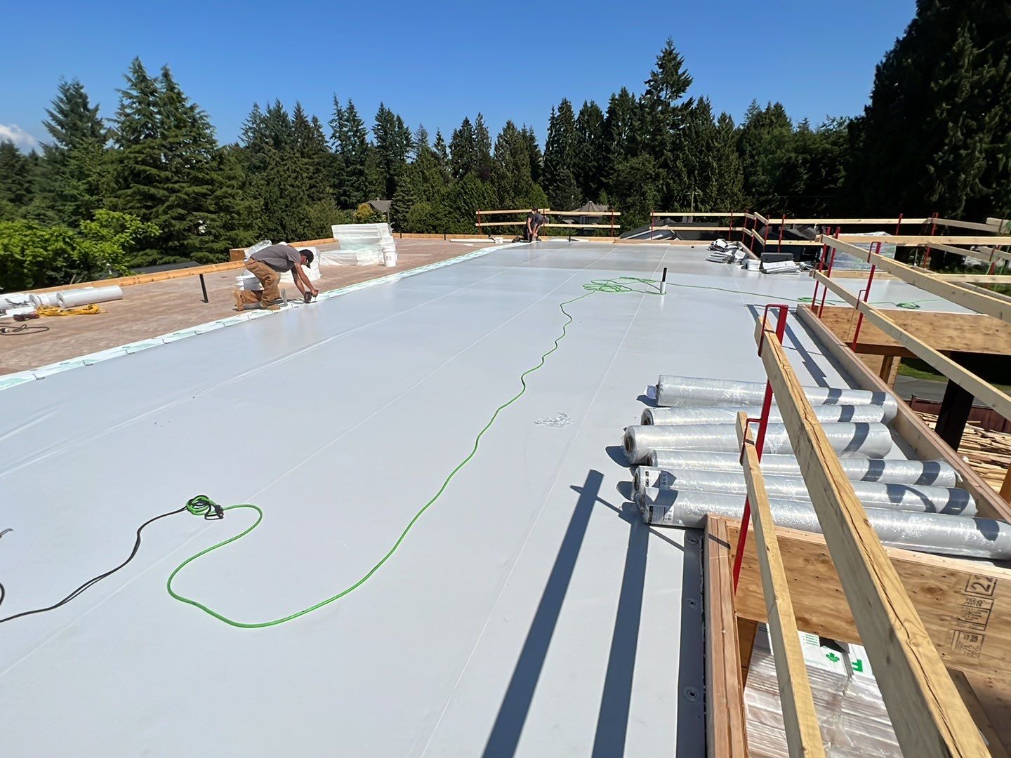 Residential Roofing Installation using Durolast roofing membrane by Top Notch Roofing Inc