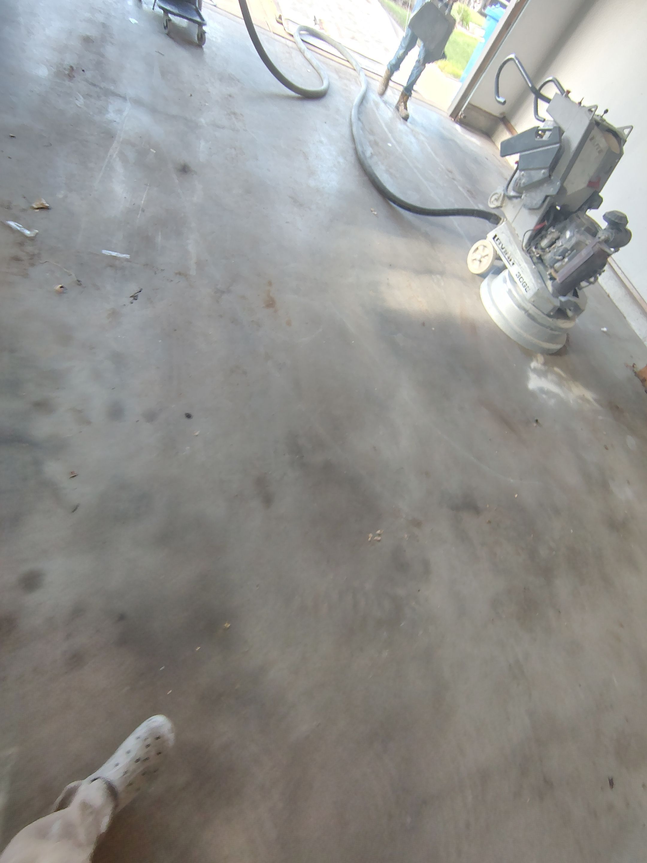 Decorative Chip Epoxy Garage Floor Coating in Sioux Falls by Select Painting, Coatings & Garage Cabinets