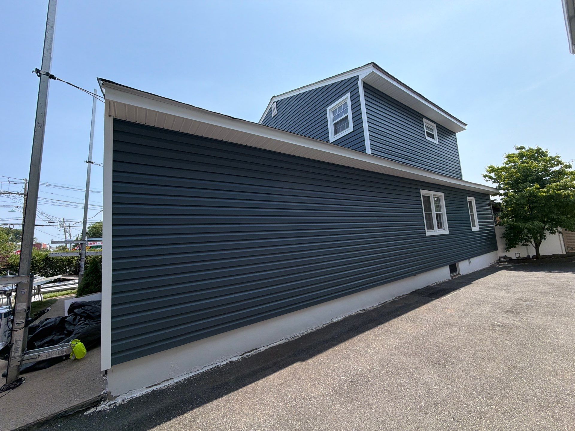 Full Exterior Renovation Featuring GAF Shingles and Siding in Kearny by REVIXPRO 