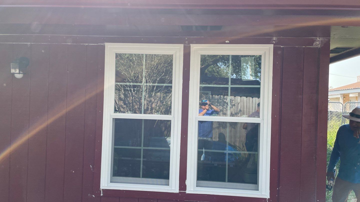 Black and white and red all over by Bayfront Roofing and Construction