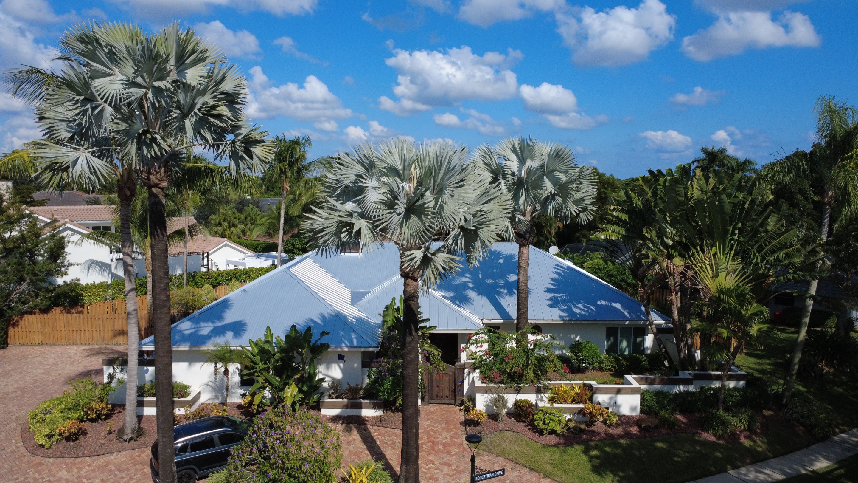 Residential Roofing Installation using 1" Nail strip metal roof by BLUES BROTHERS CONSTRUCTION CORP
