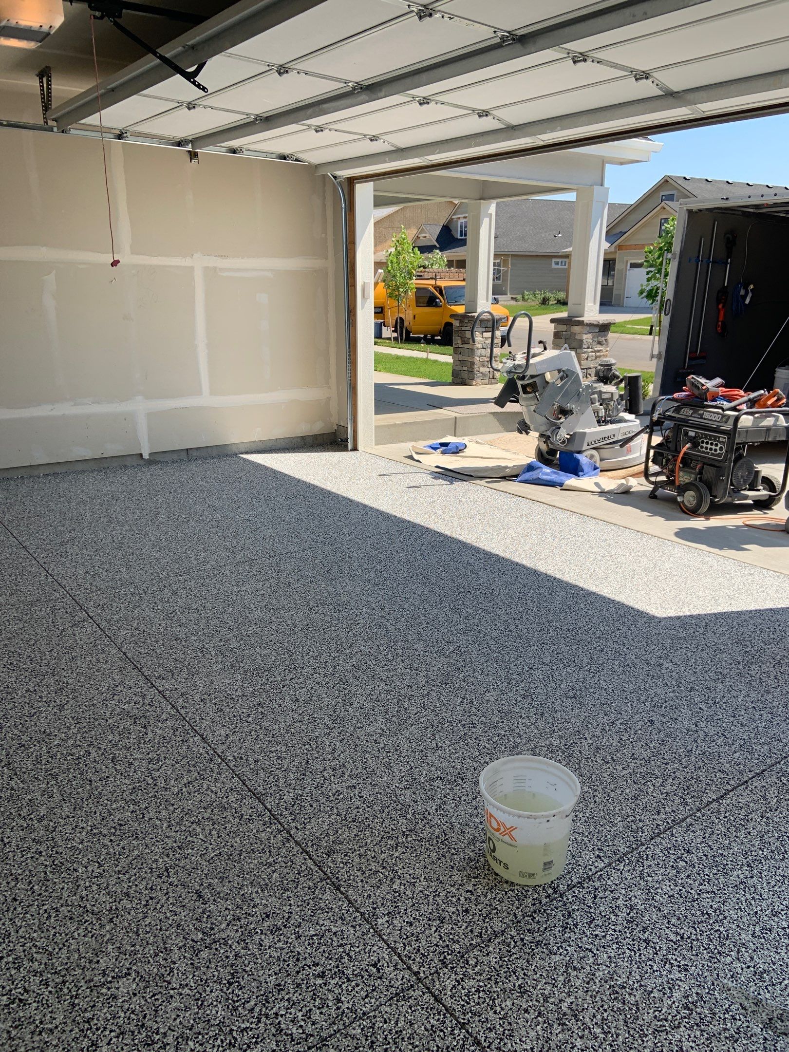 Garage Transformation using Domino by Croc Coatings, LLC