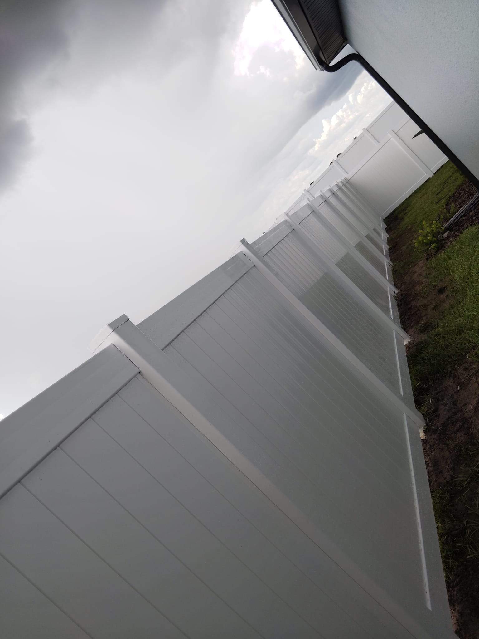 White Vinyl Privacy Fence Installation for North Port Residential Property by True Fence LLC