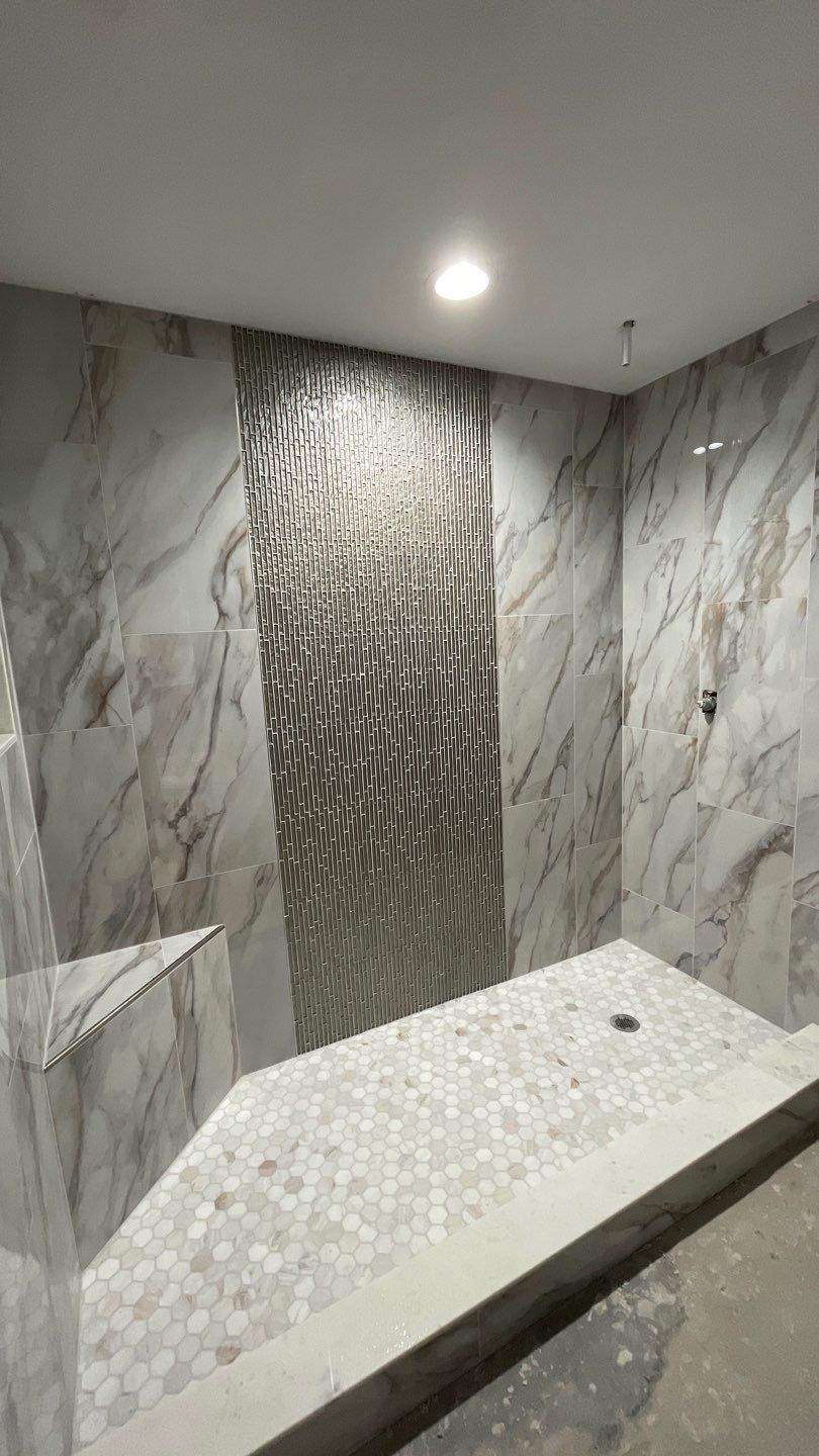 Stunning shower with Rain Glass by Footprints Bath and Tile of East Atlanta
